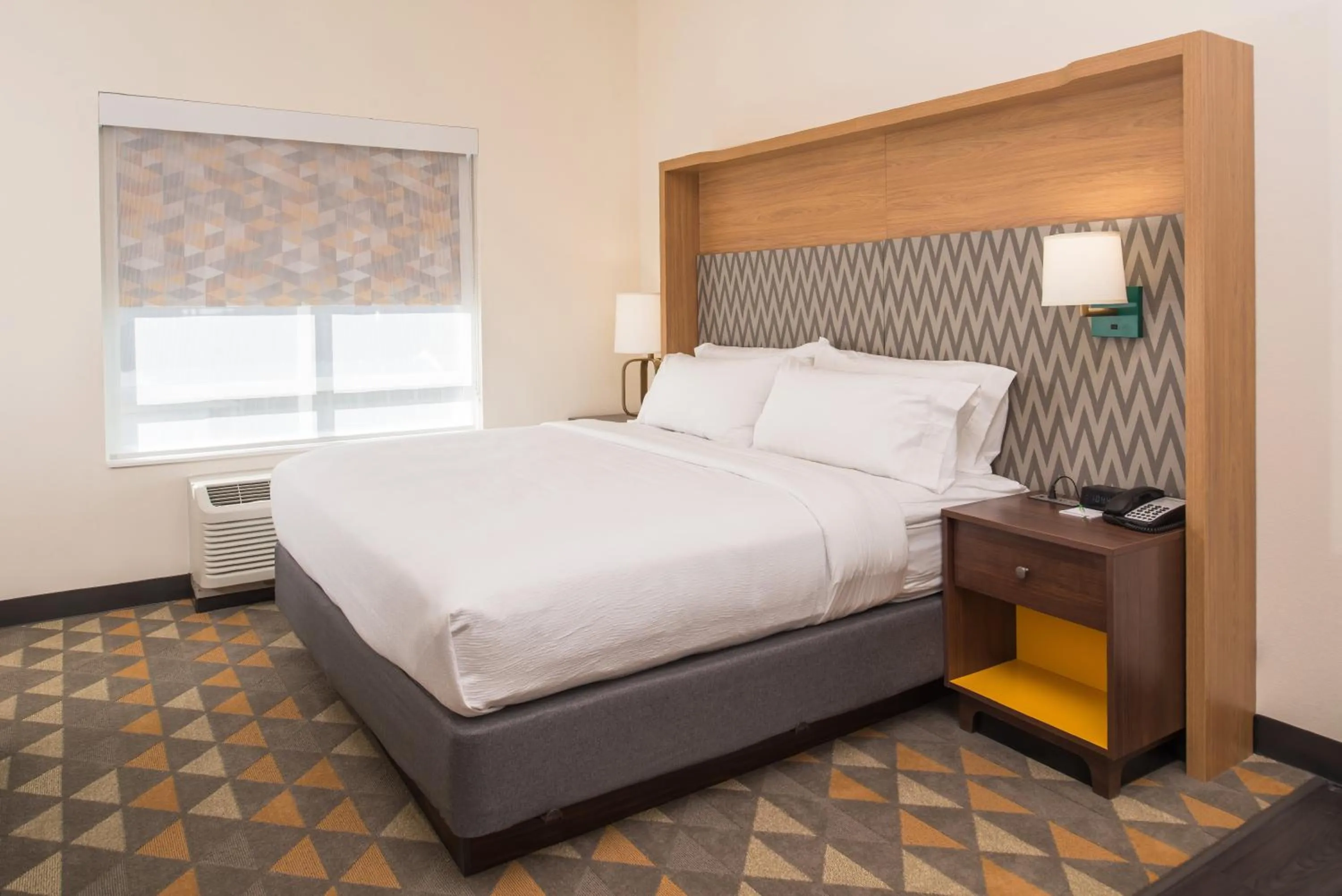 Photo of the whole room, Bed in Holiday Inn Joplin by IHG