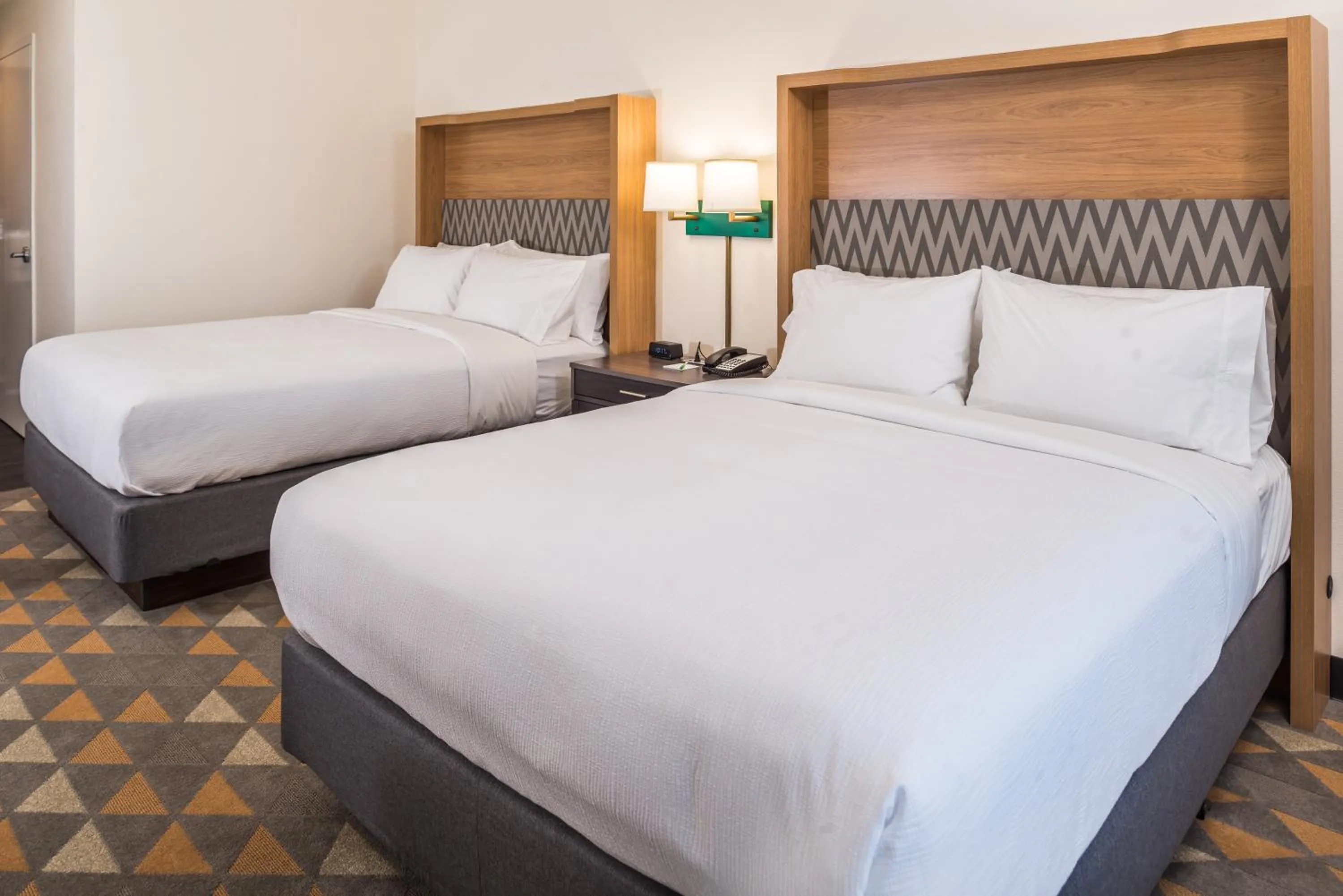 Photo of the whole room, Bed in Holiday Inn Joplin by IHG