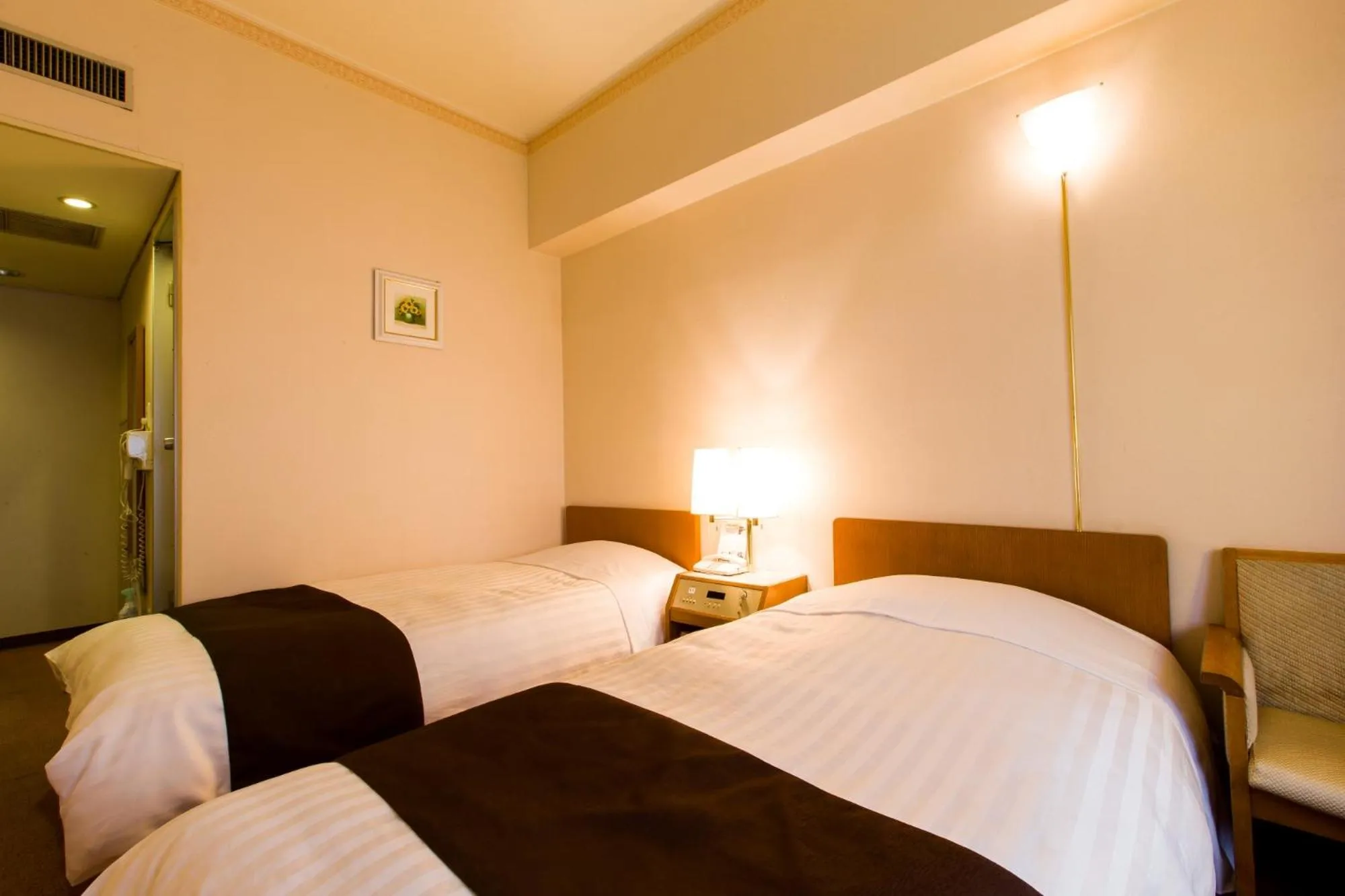 Bed in Hotel New Star Ikebukuro