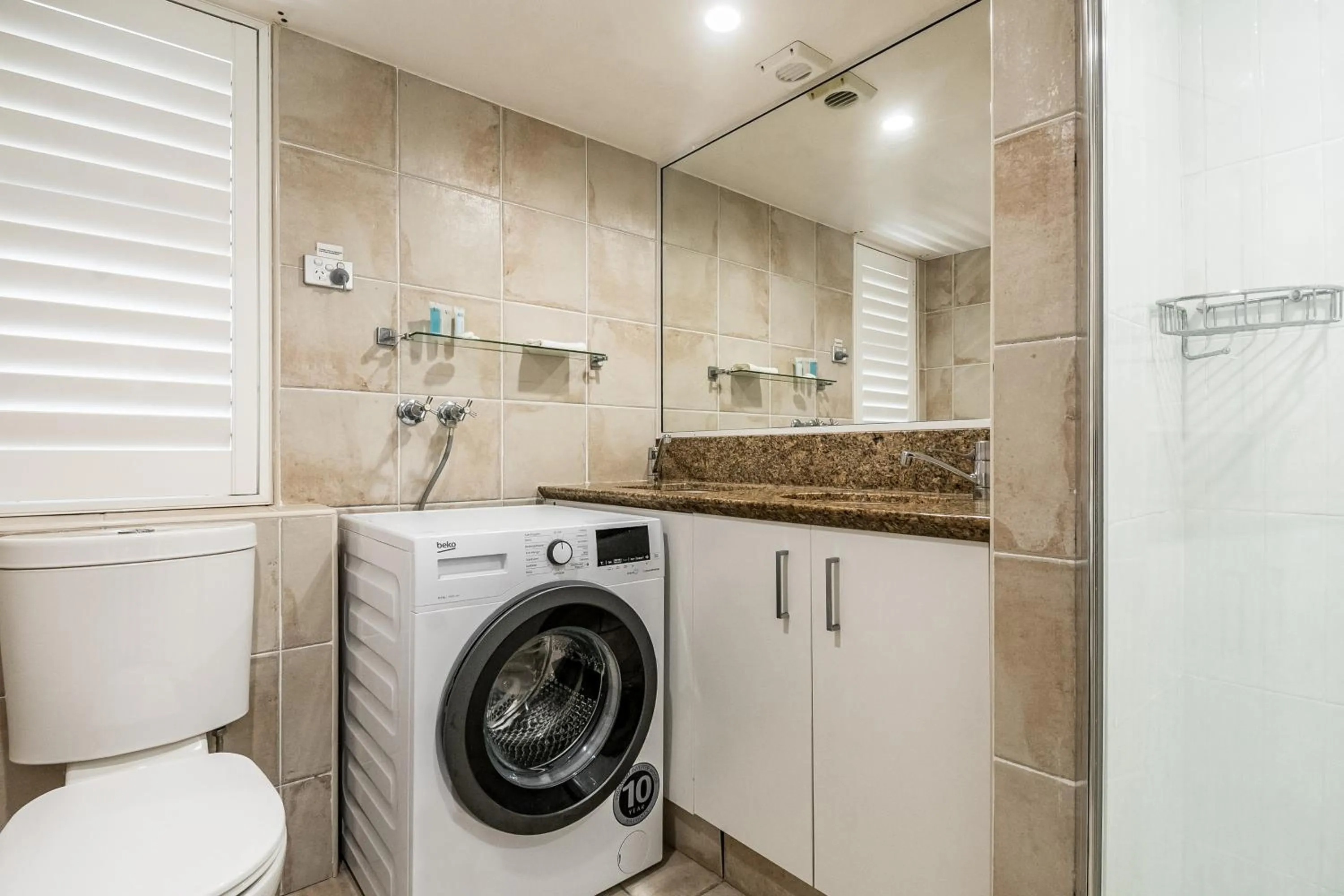 Toilet in Julians Apartments