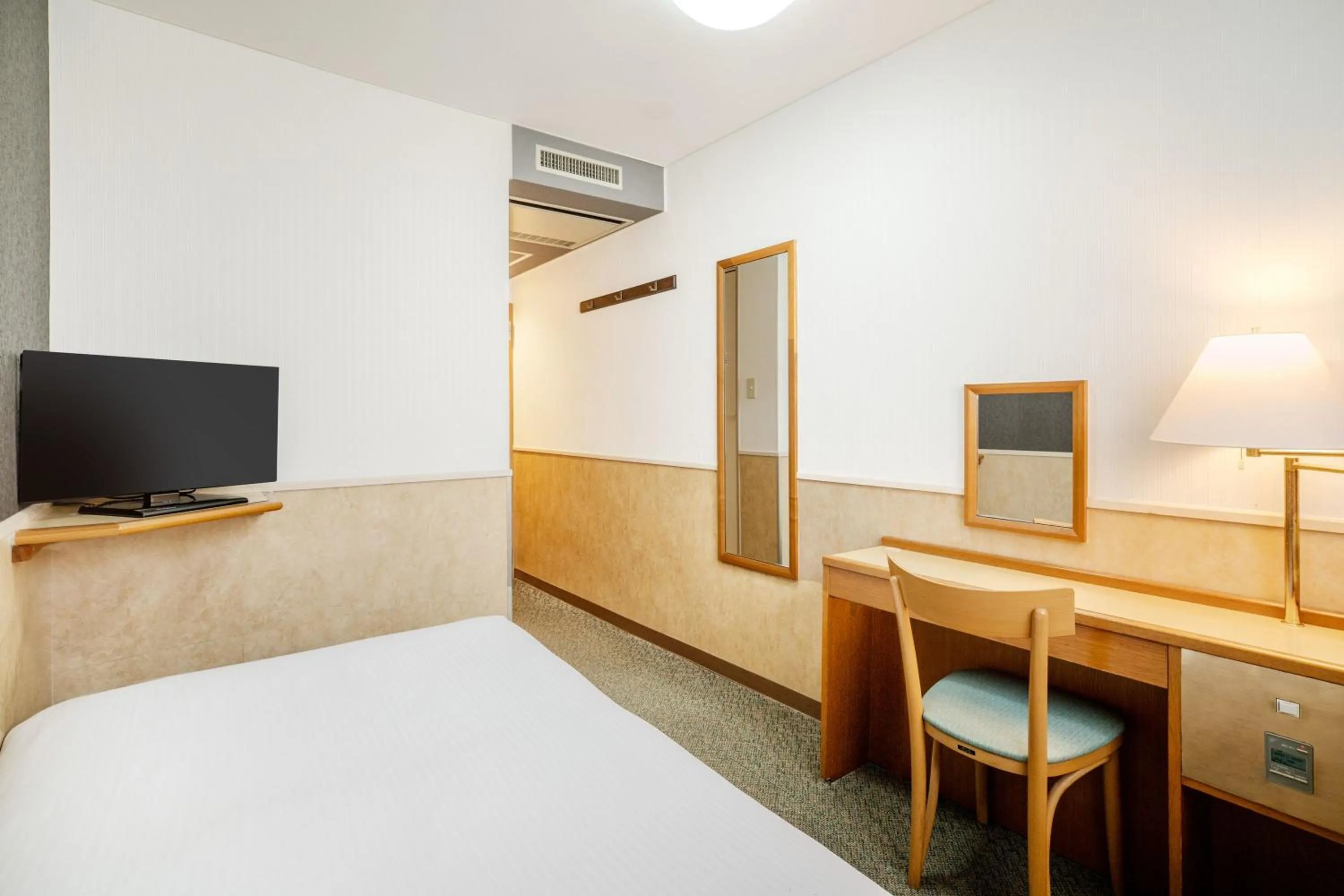 Photo of the whole room, Bed in Central Hotel Sasebo