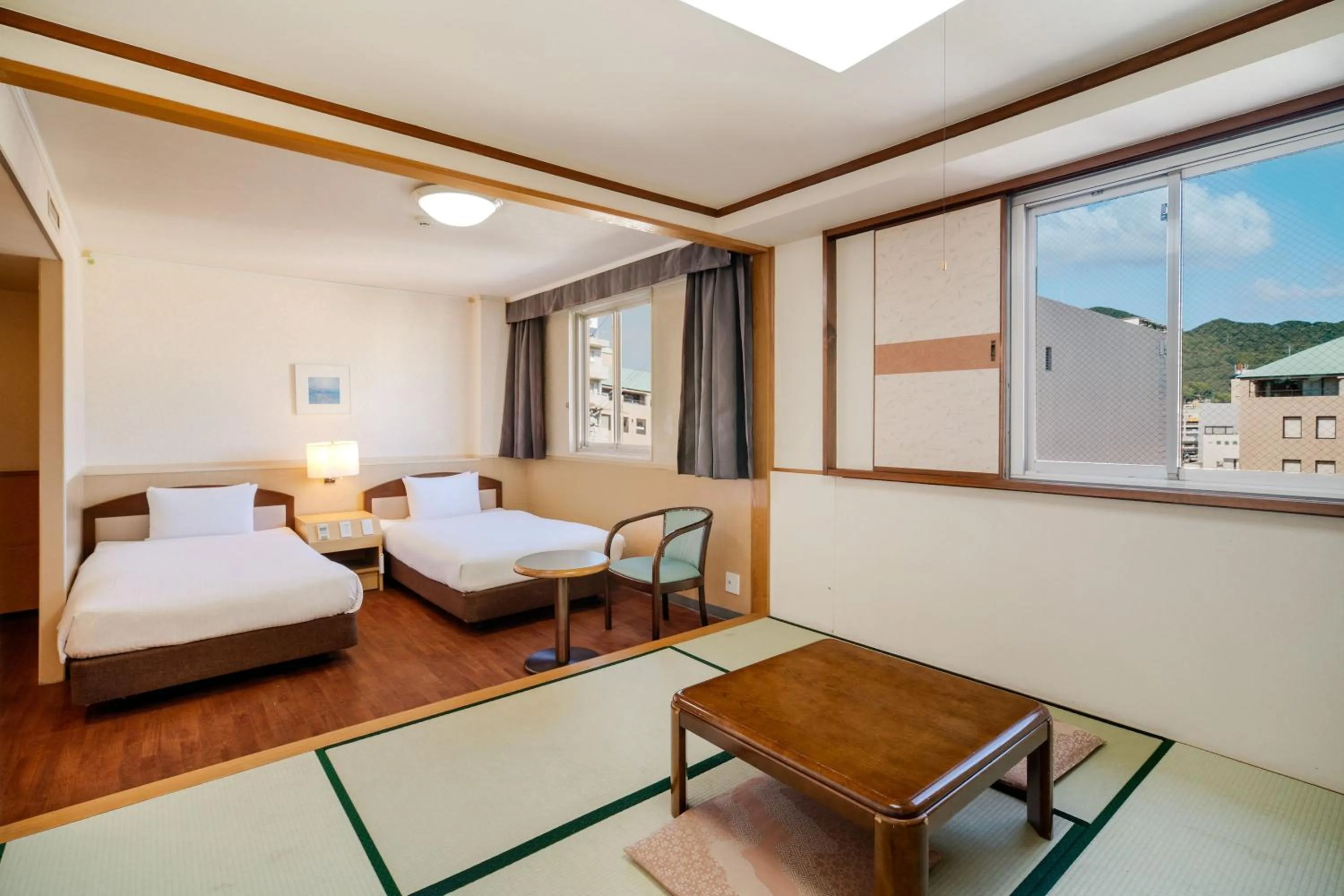 Bed in Central Hotel Sasebo