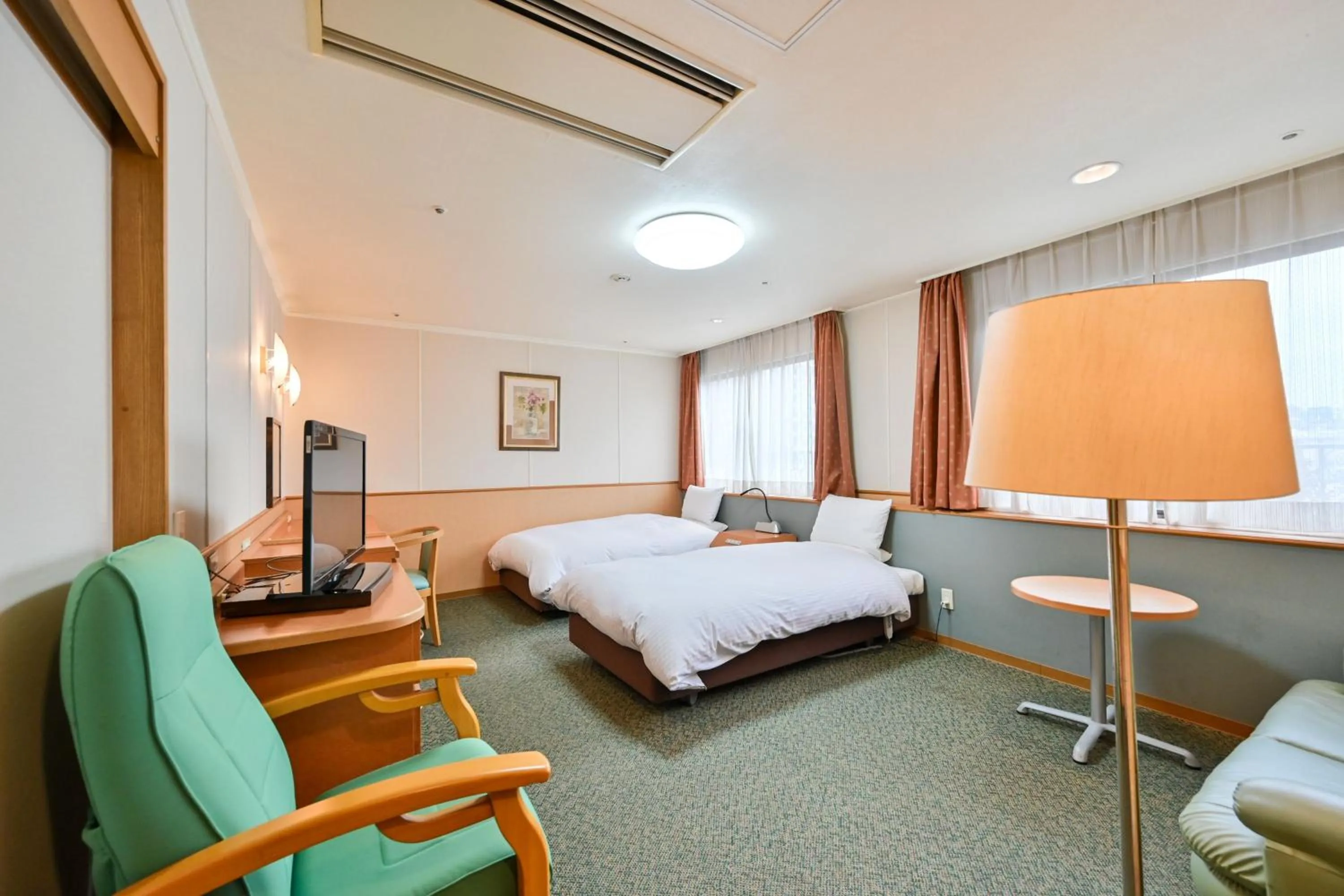 Bed in Central Hotel Sasebo