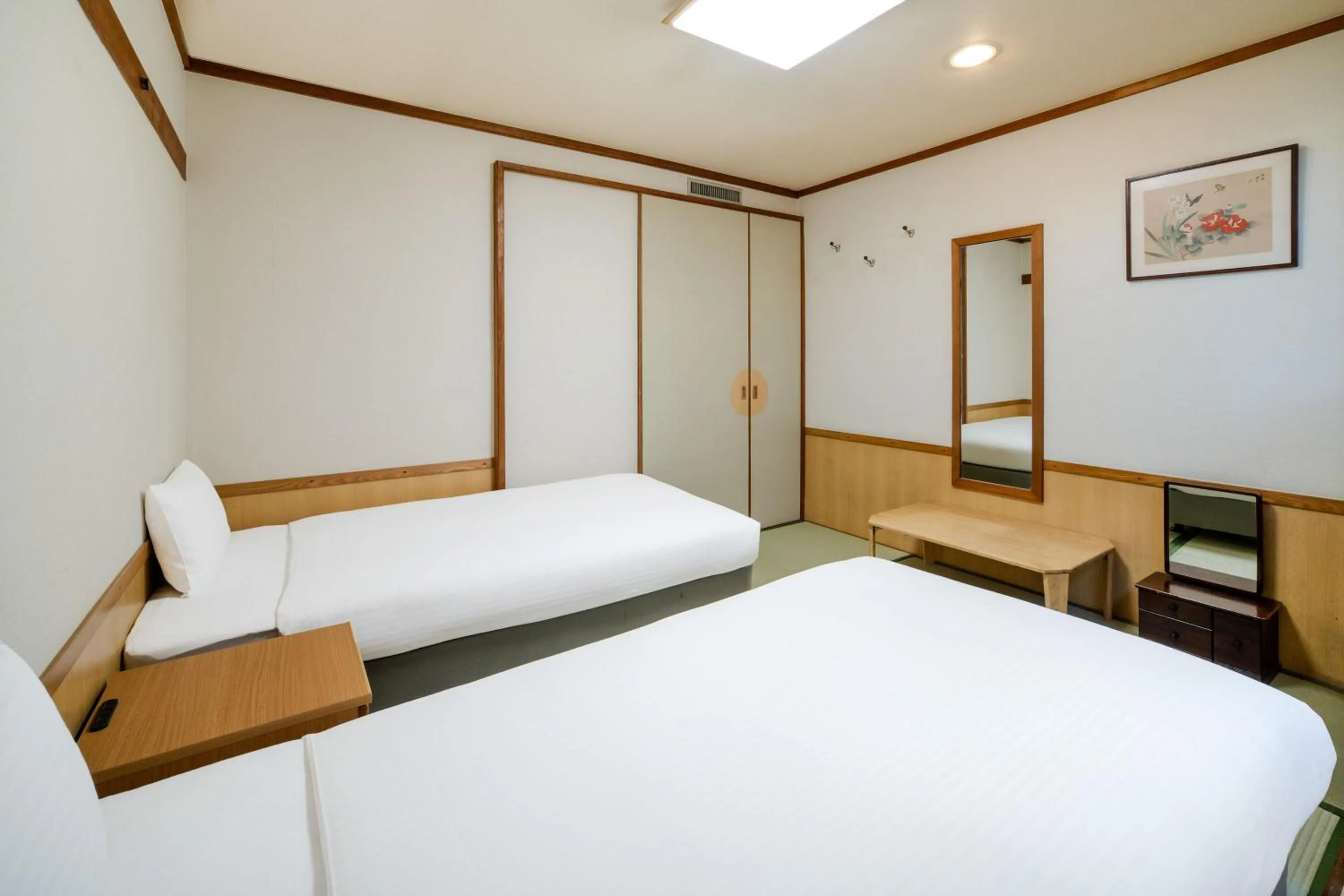 Bed in Central Hotel Sasebo