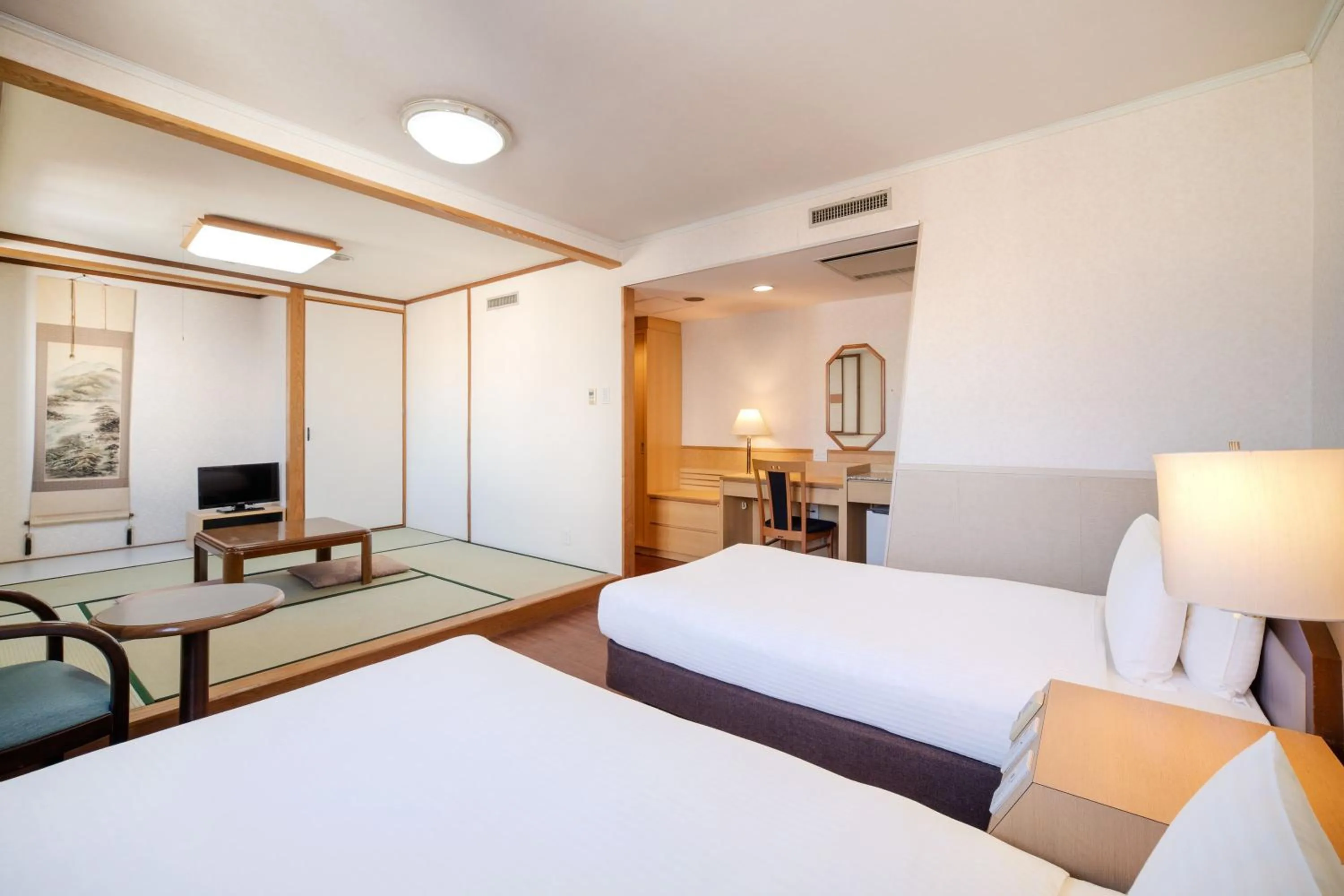 Bed in Central Hotel Sasebo