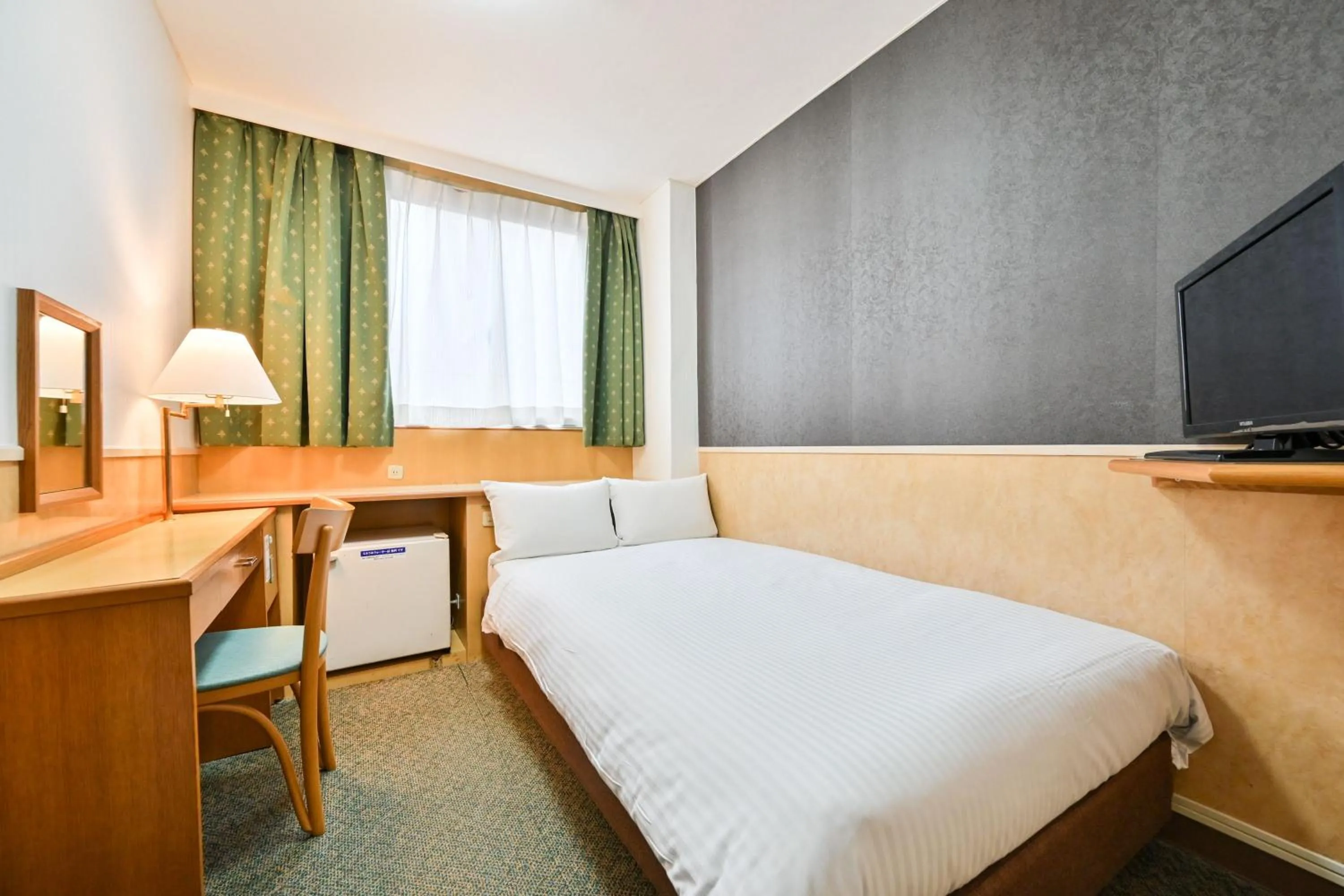 Photo of the whole room, Bed in Central Hotel Sasebo
