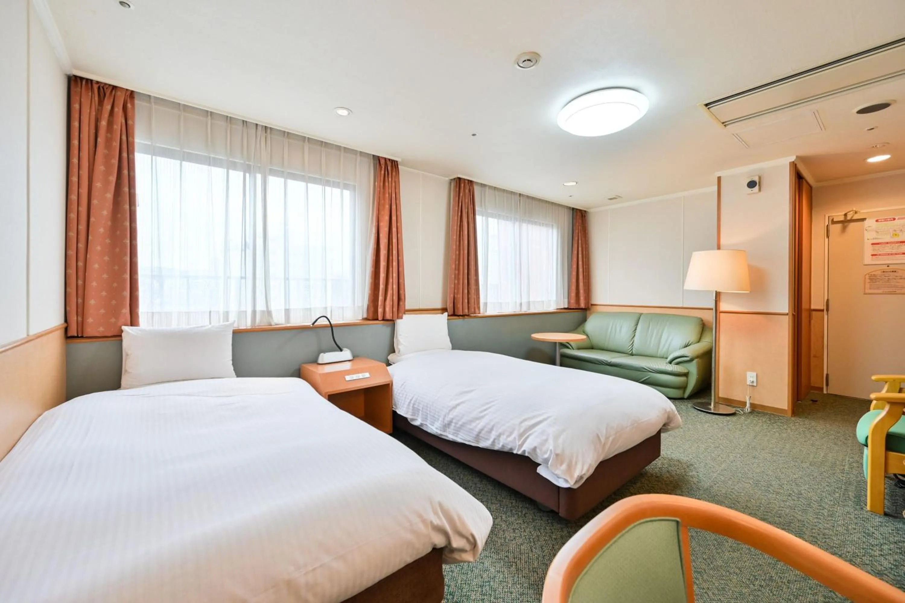 Bed in Central Hotel Sasebo