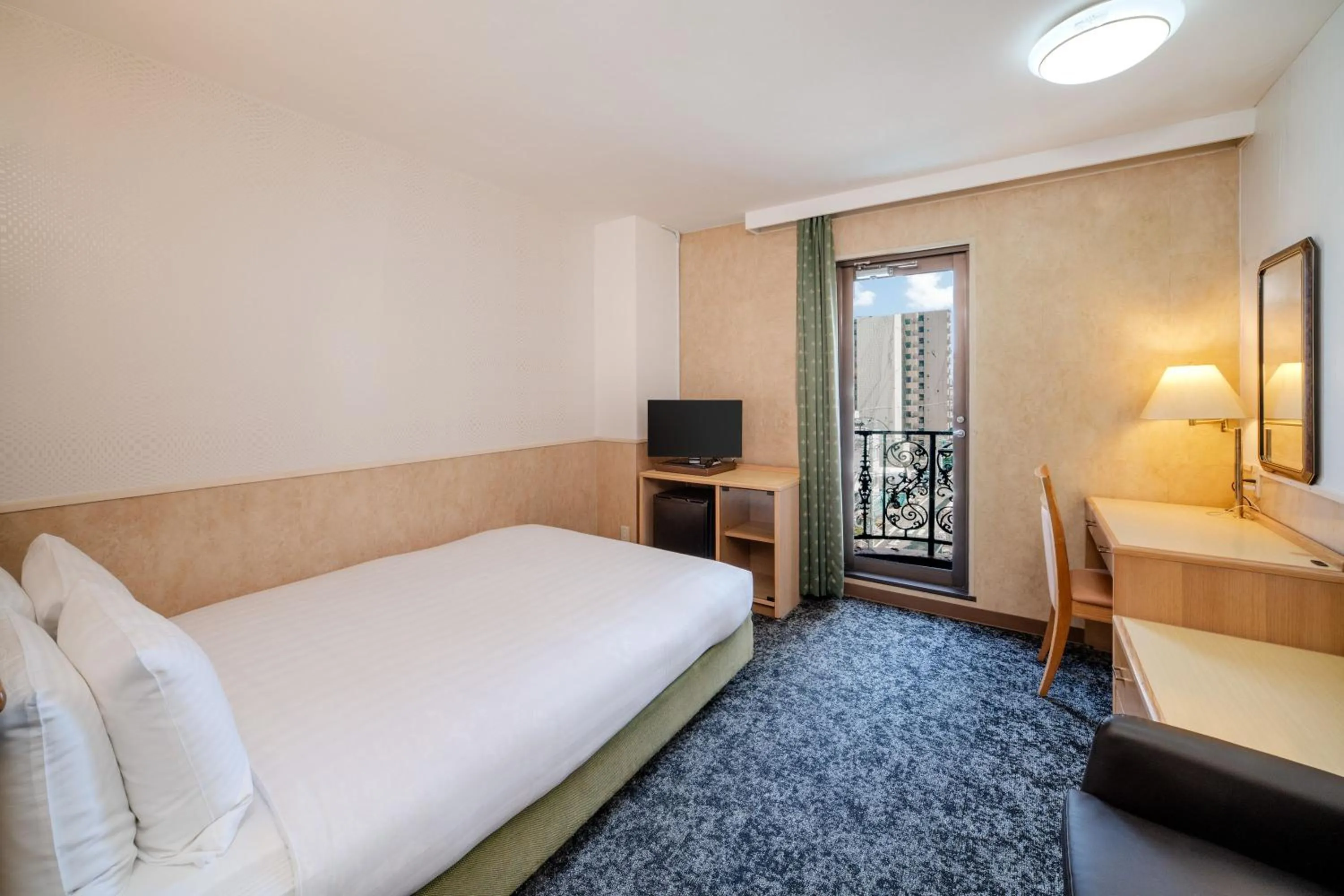 Bed in Central Hotel Sasebo