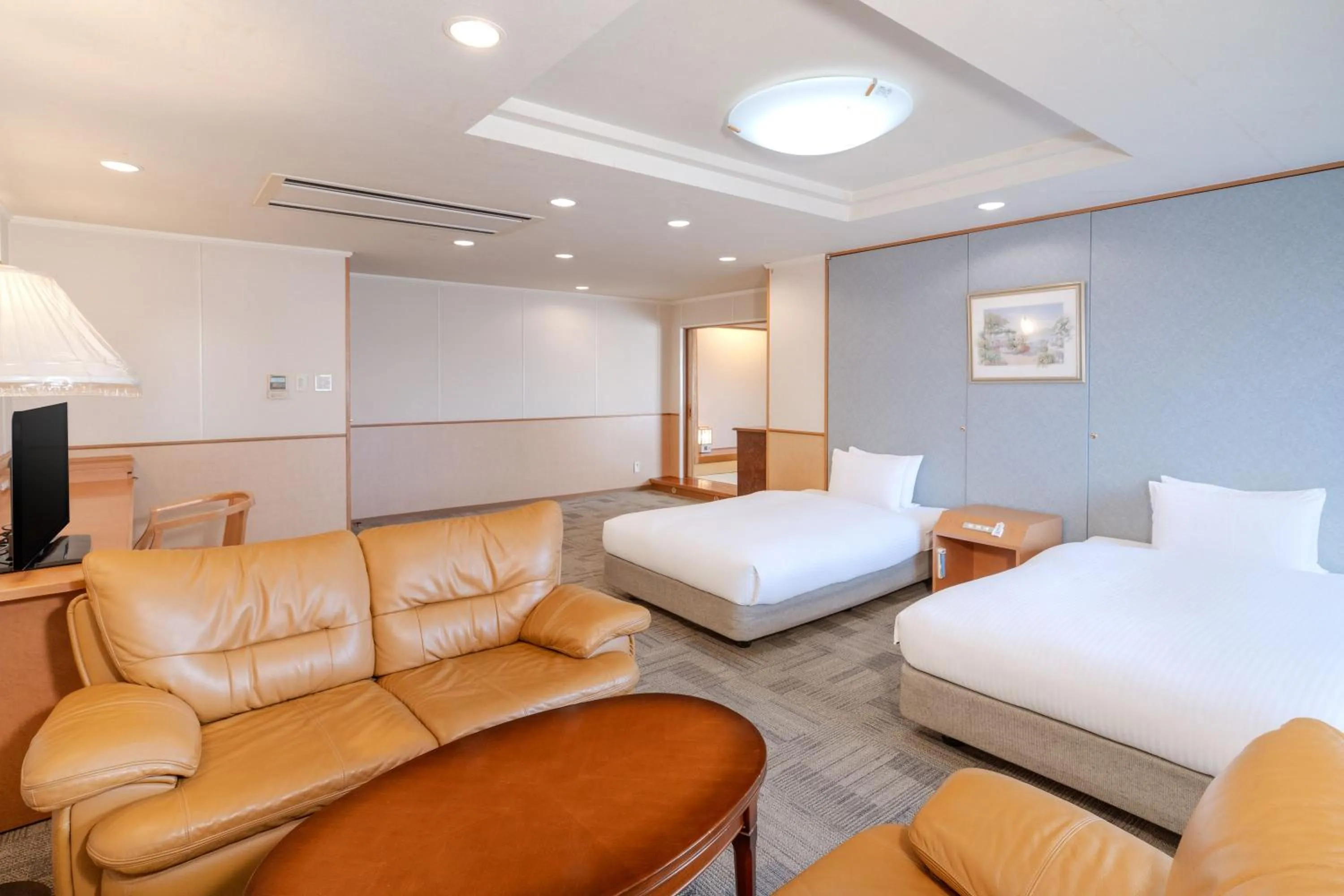 Bed in Central Hotel Sasebo