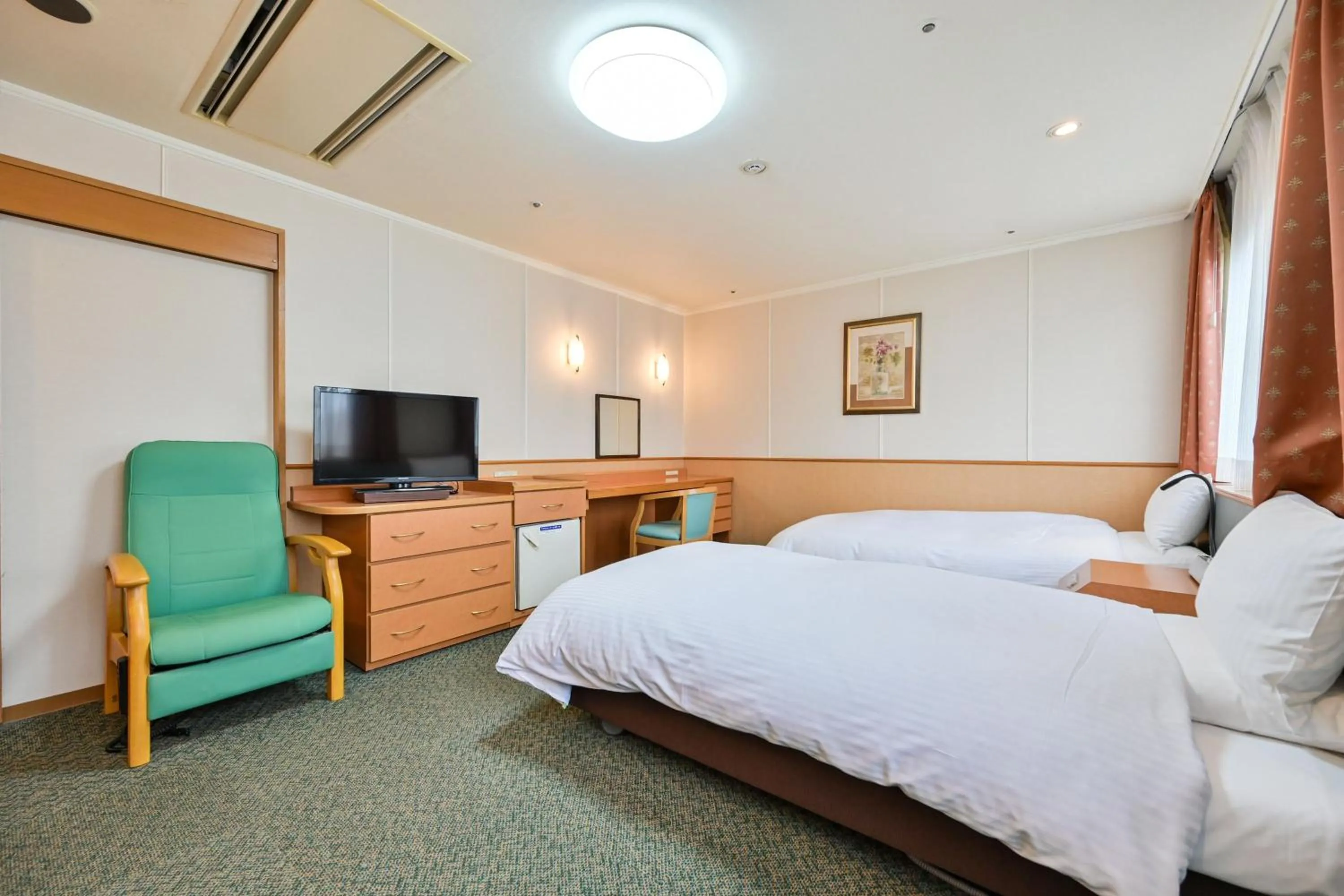 Bed in Central Hotel Sasebo