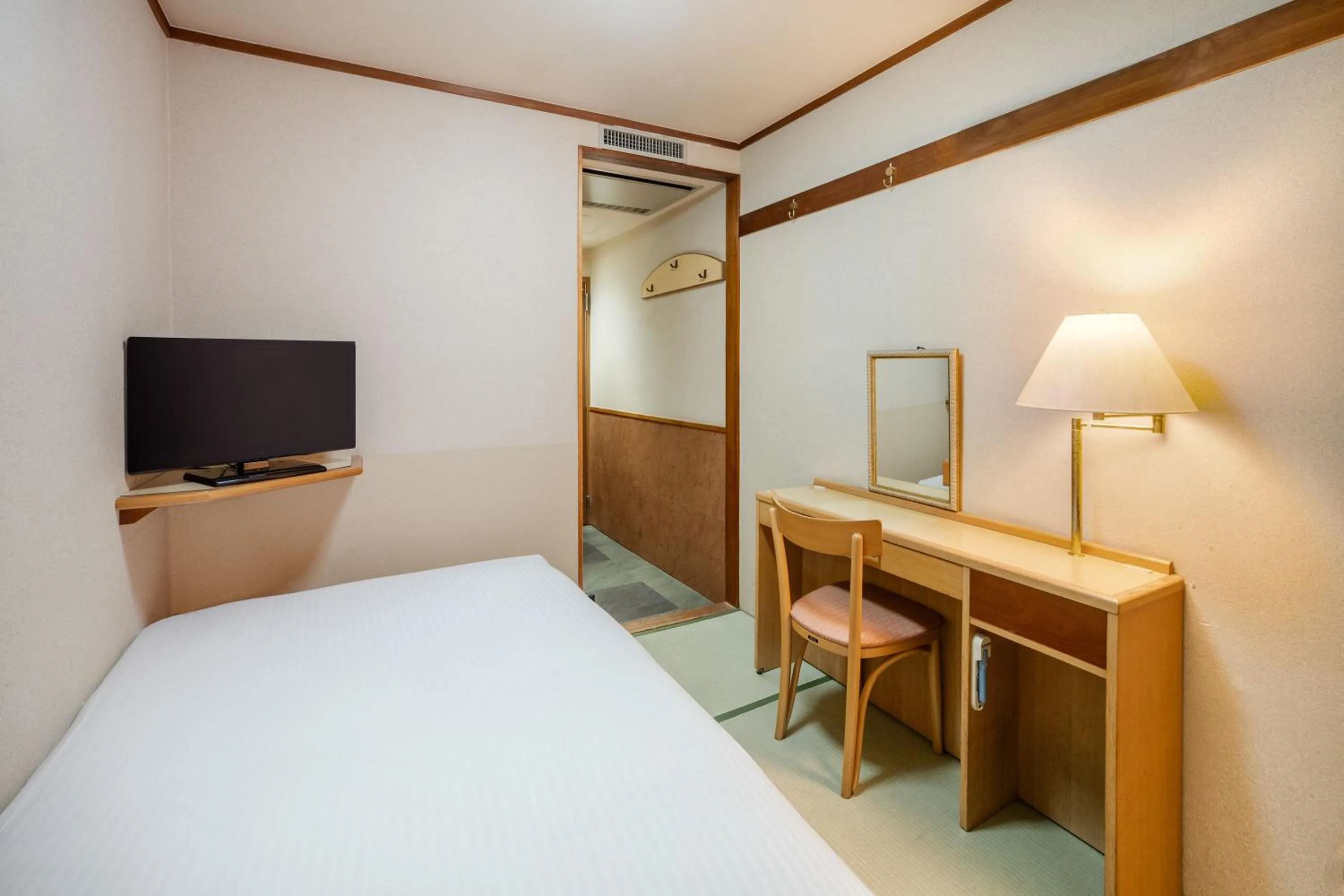 Bed in Central Hotel Sasebo