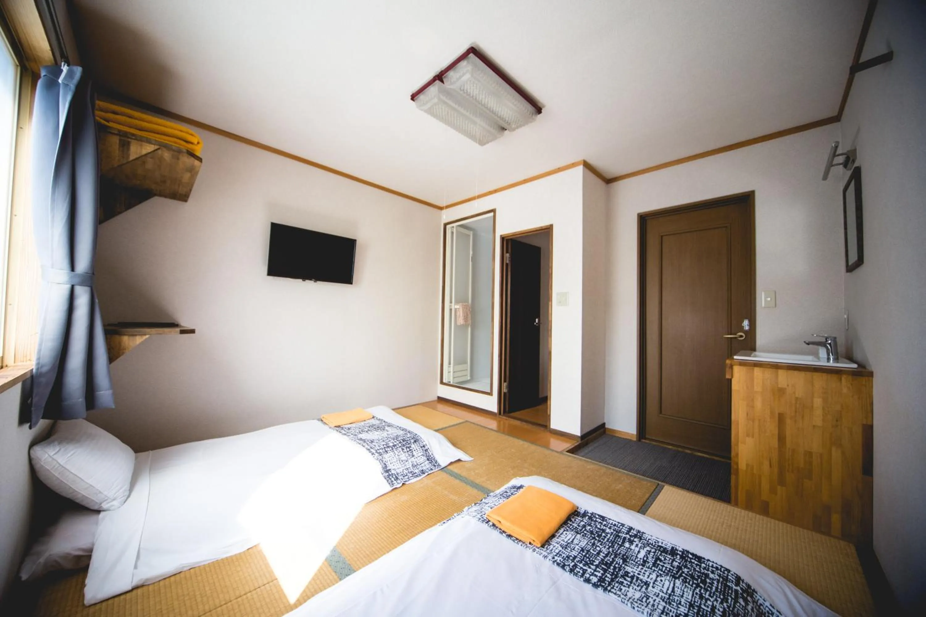 TV and multimedia, Bed in Hakuba Cortina Lodge
