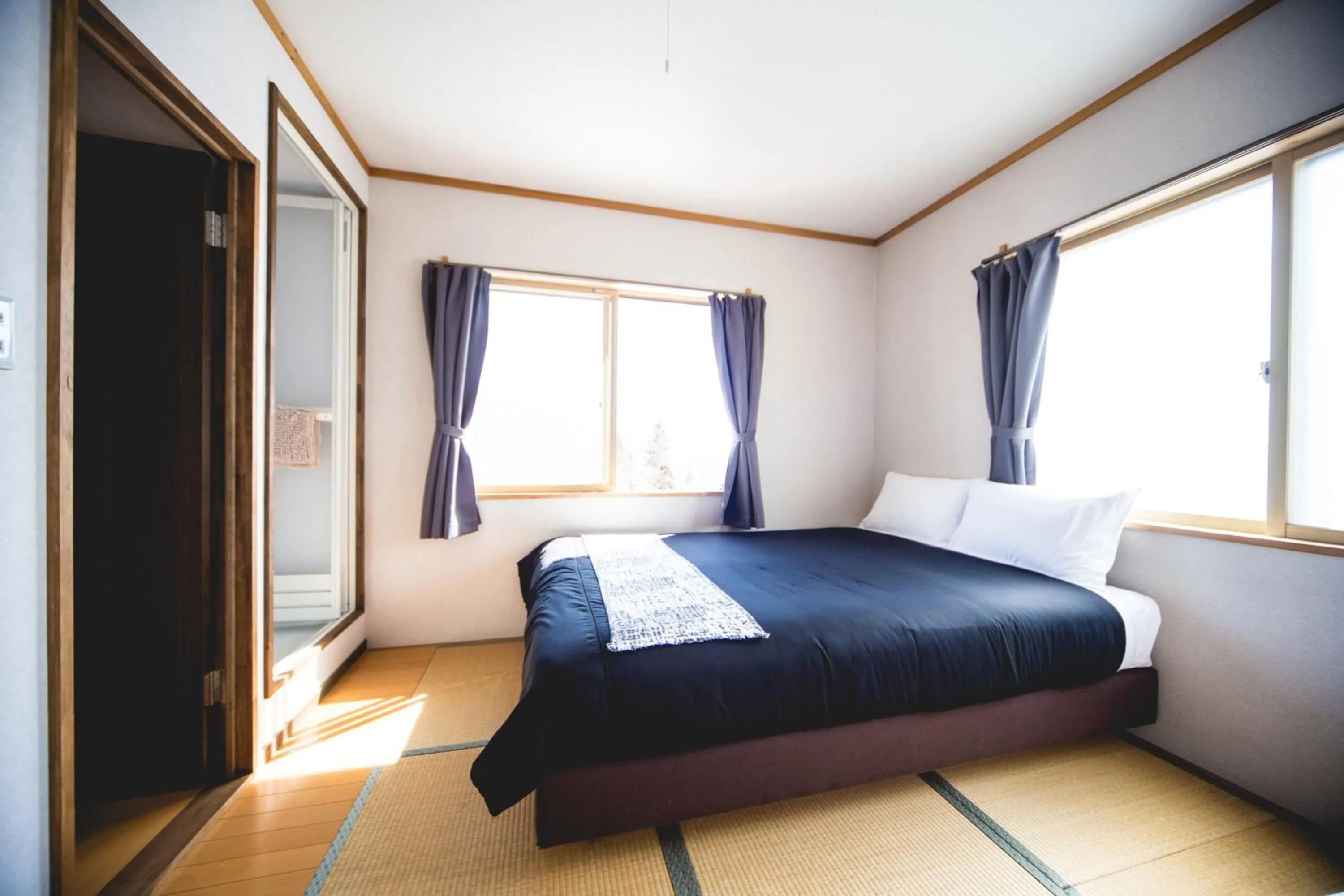 Bed in Hakuba Cortina Lodge