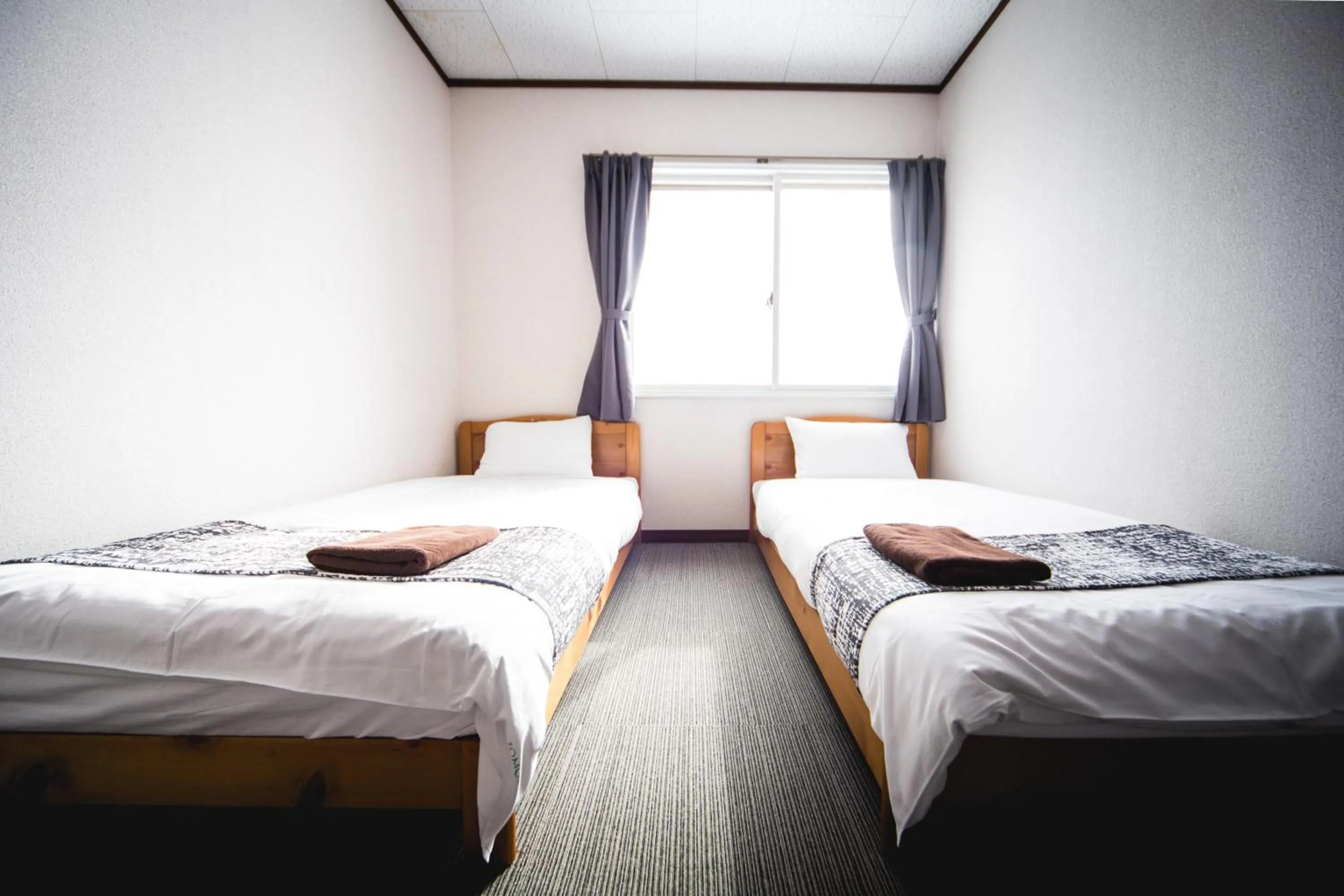 Bed in Hakuba Cortina Lodge
