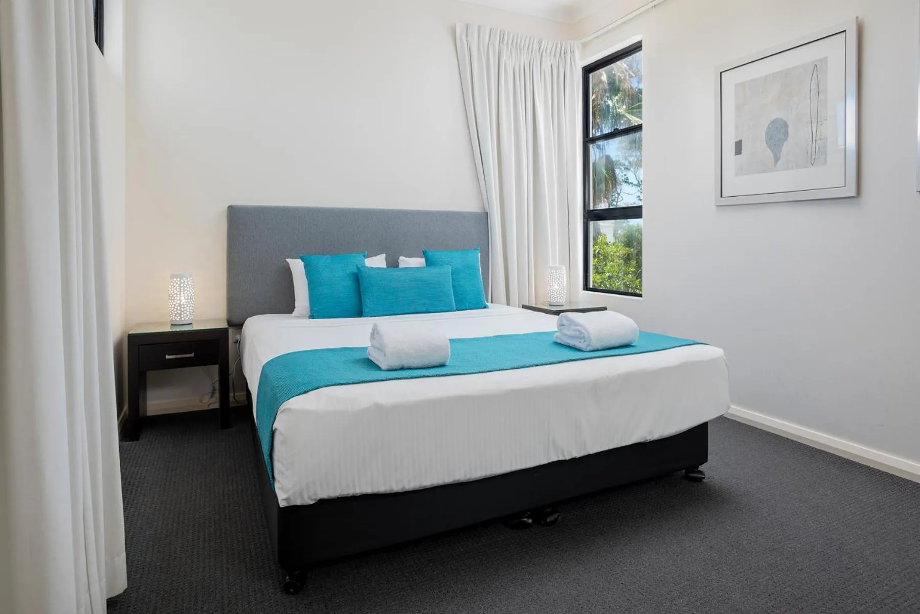 Bed in The Bay Apartments