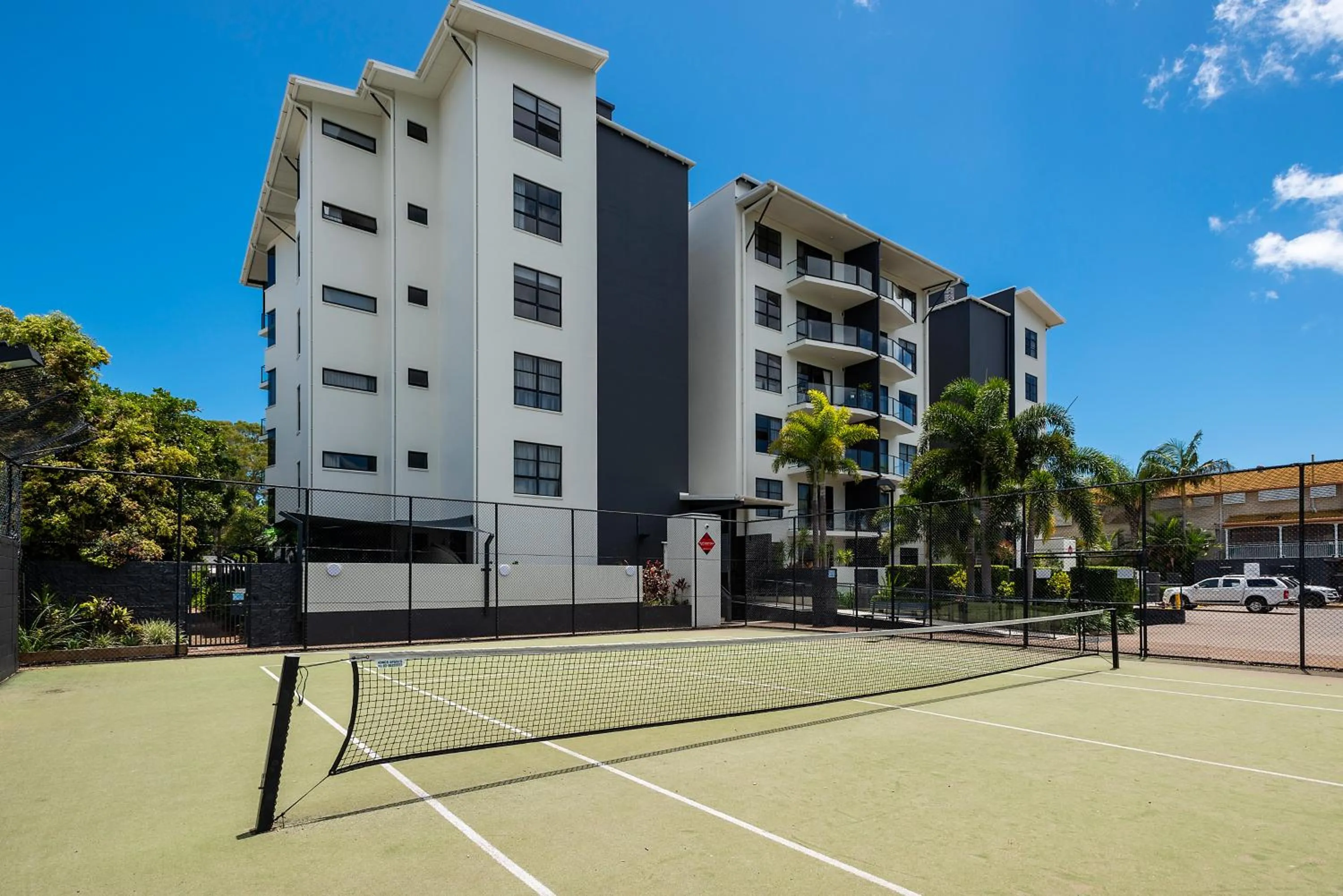 Tennis court in The Bay Apartments