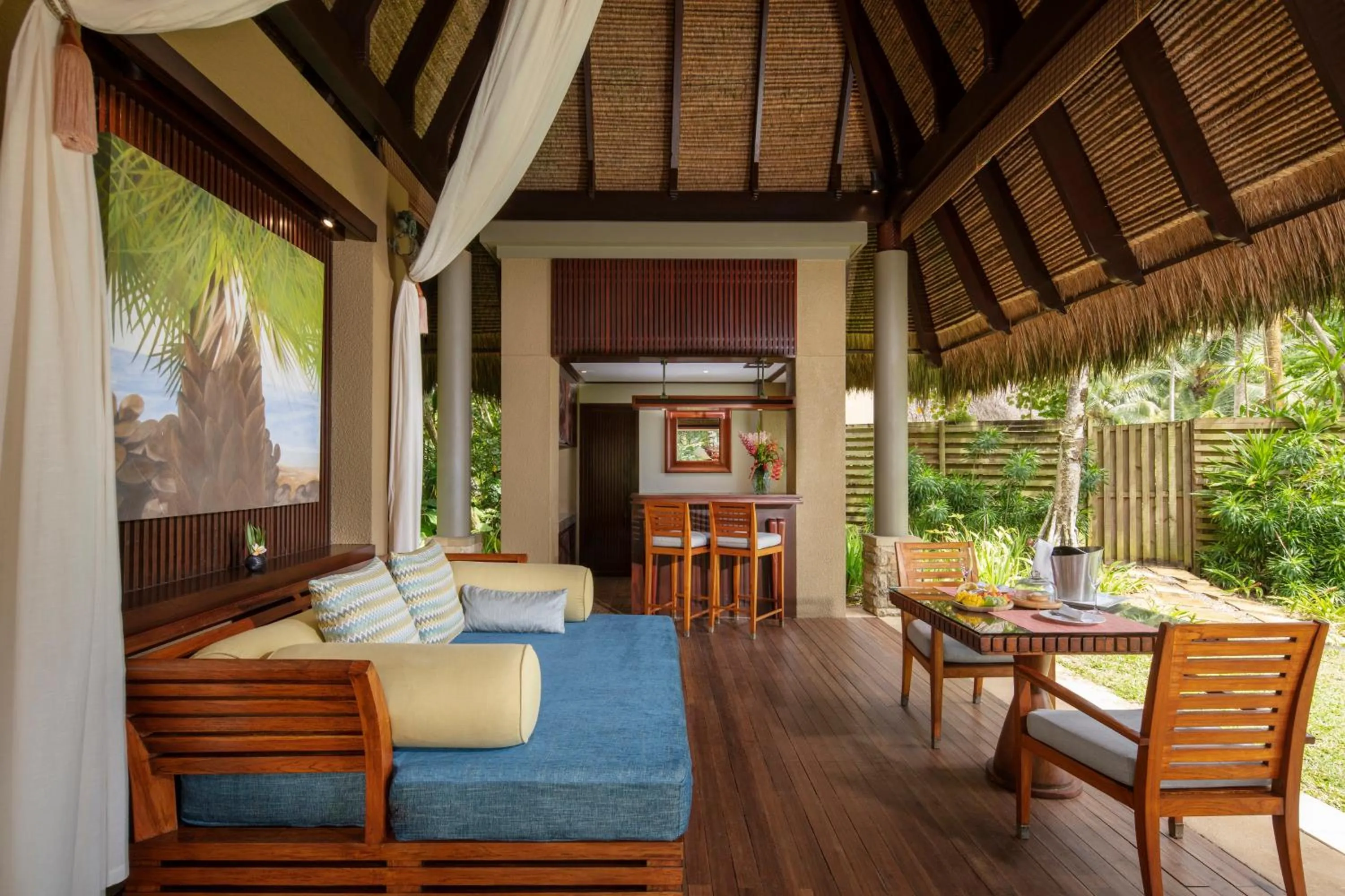 Seating area in Anantara Maia Seychelles Villas