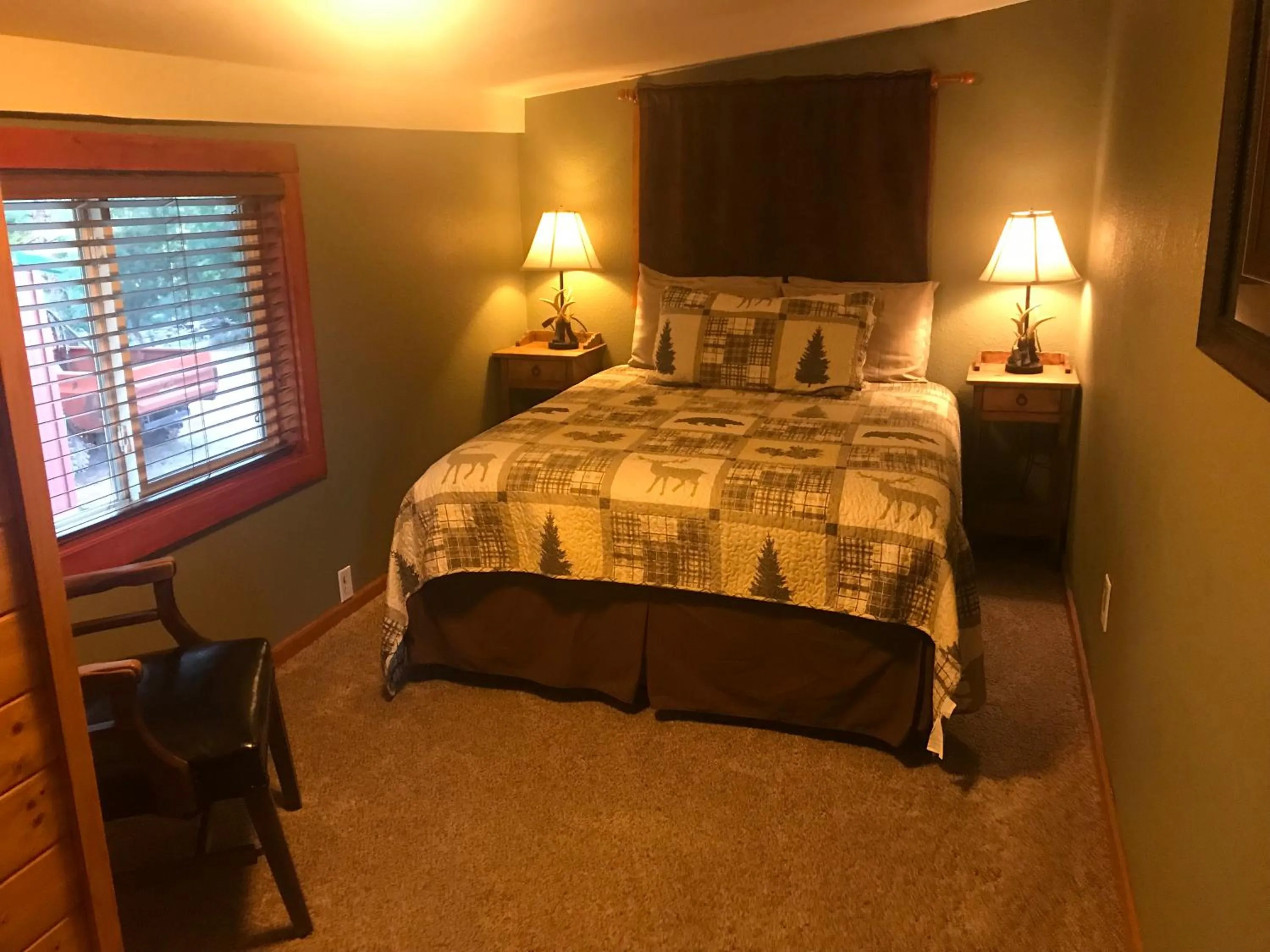 Bed in Gonzales Cozy Little Bear Cabin