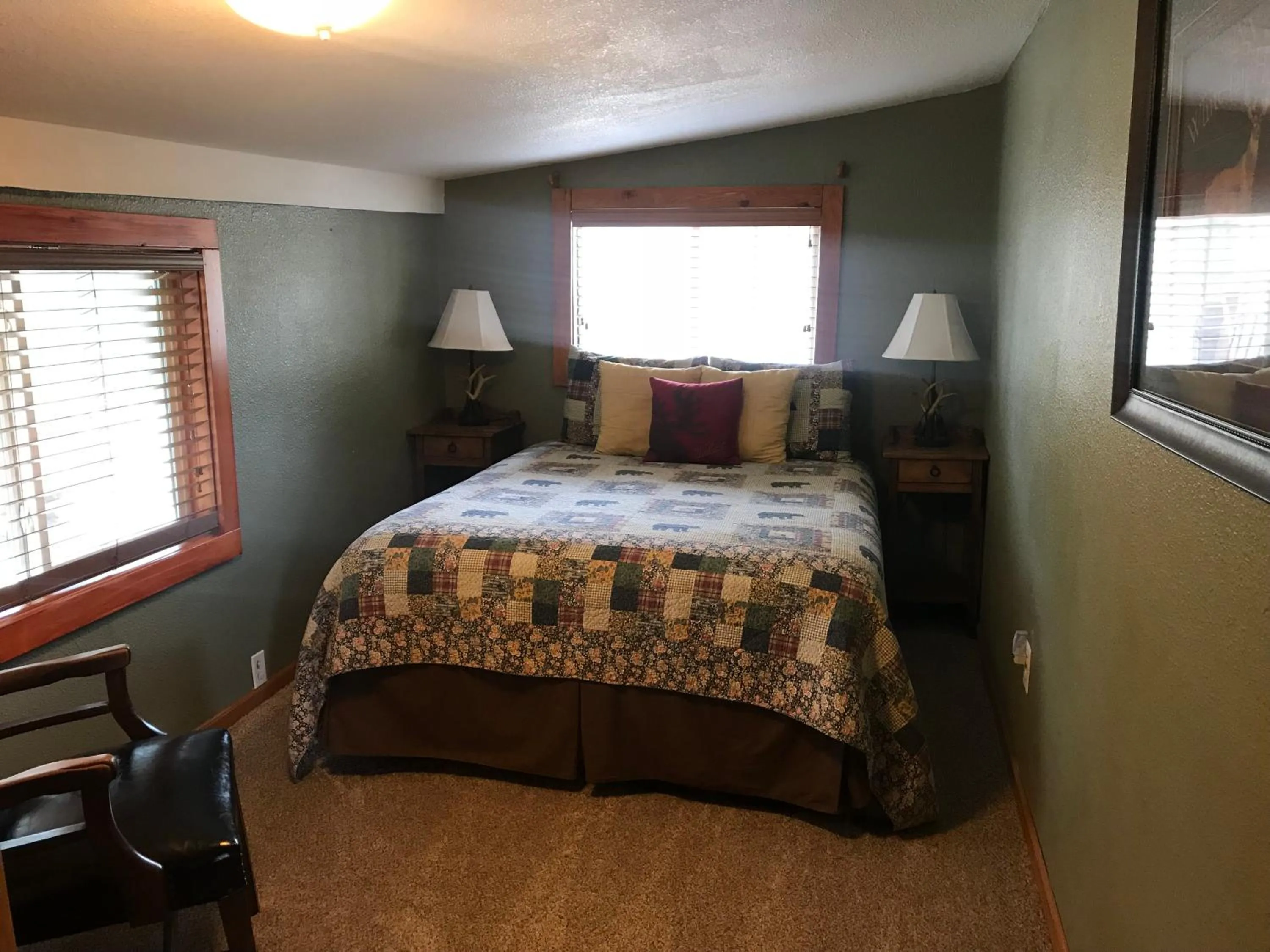 Bed in Gonzales Cozy Little Bear Cabin