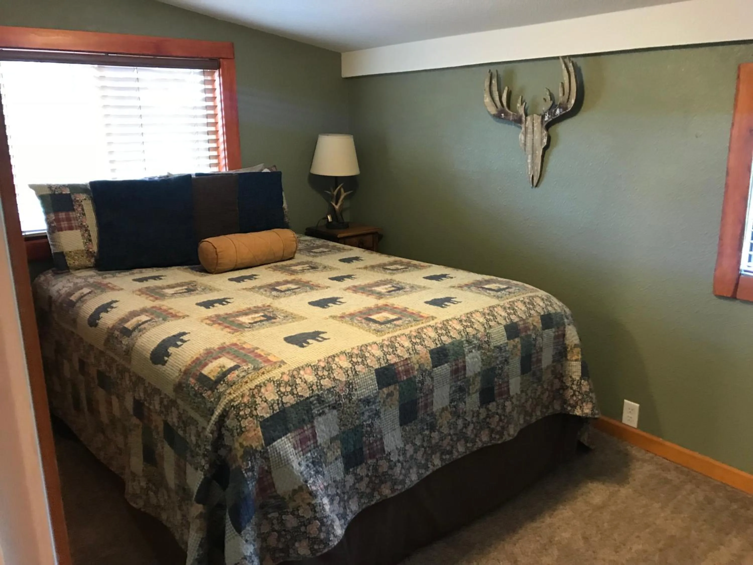 Bed in Gonzales Cozy Little Bear Cabin