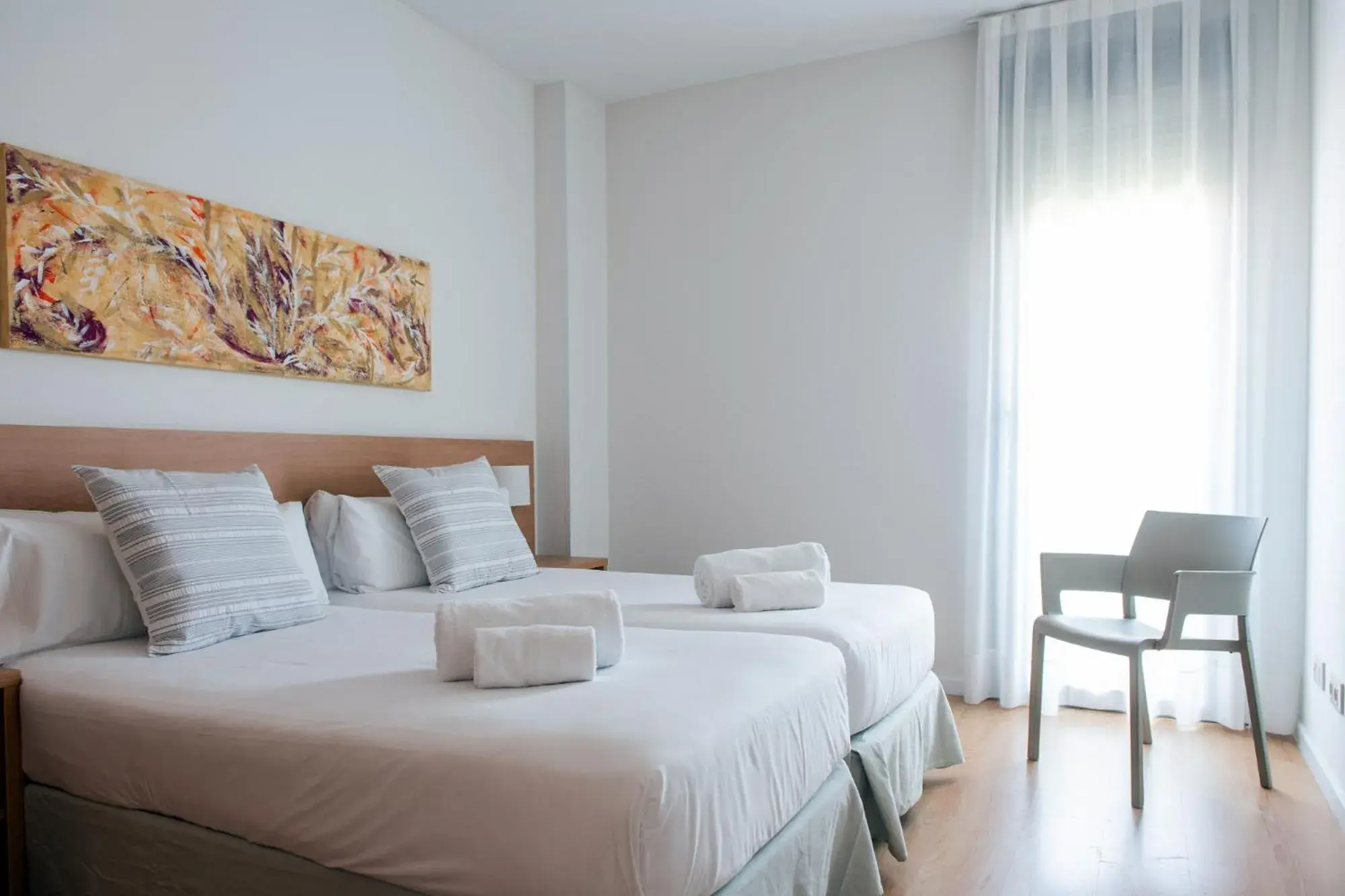 Text overlay, Bed in Apartamentos Aura Park Fira BCN Text overlay, Bed in Apartamentos Aura Park Fira BCN