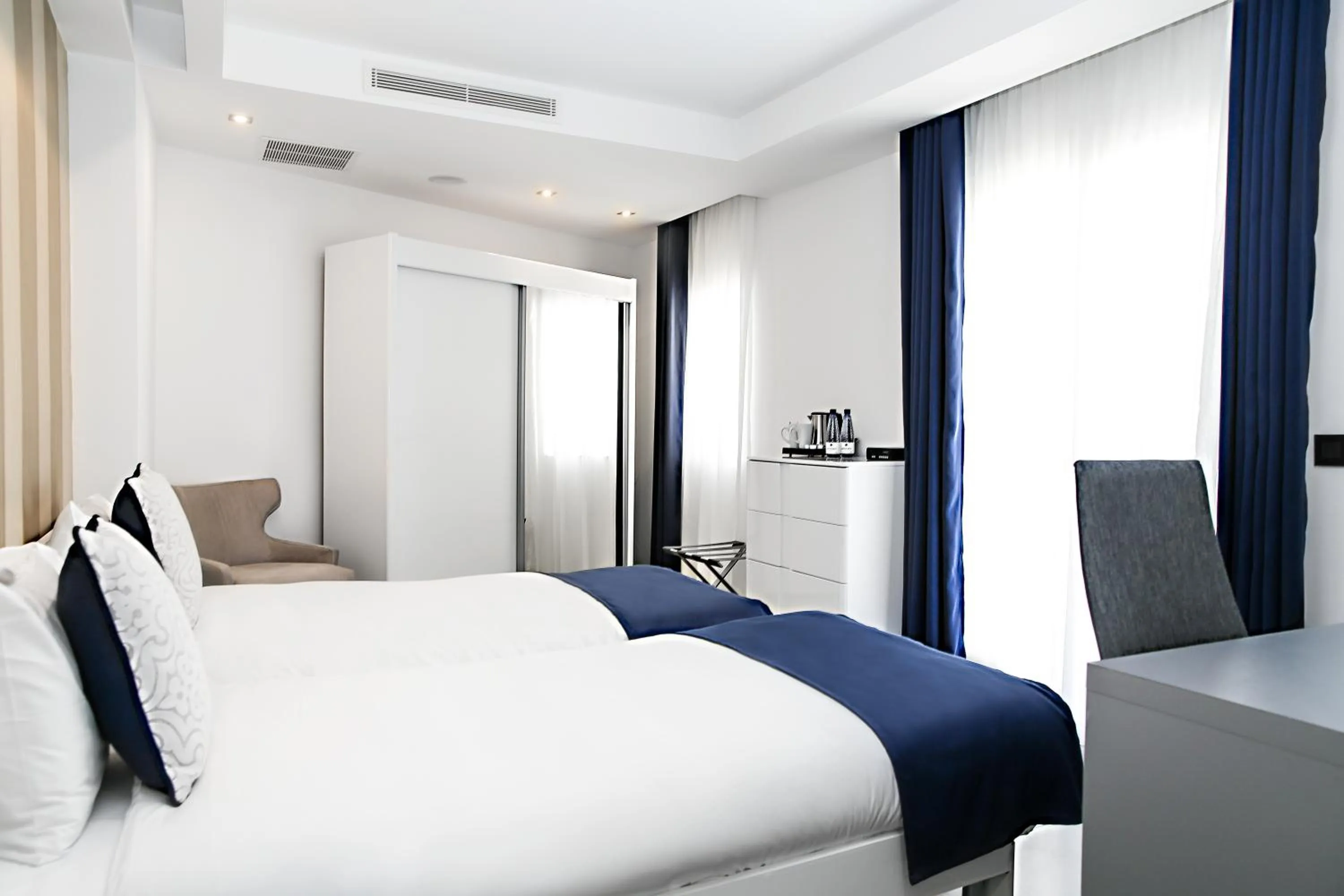 Bedroom in Pebbles Boutique Aparthotel