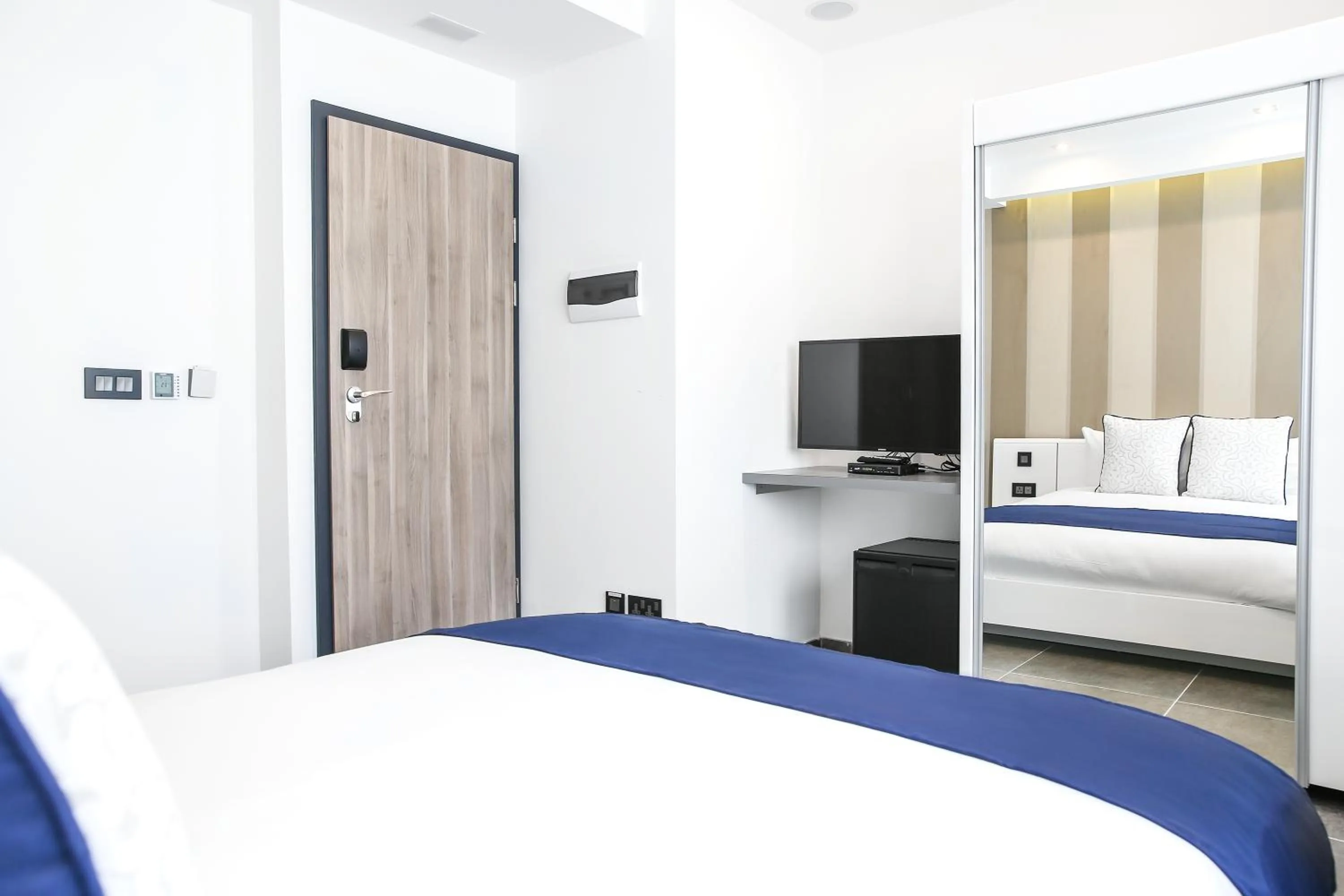 Bedroom in Pebbles Boutique Aparthotel