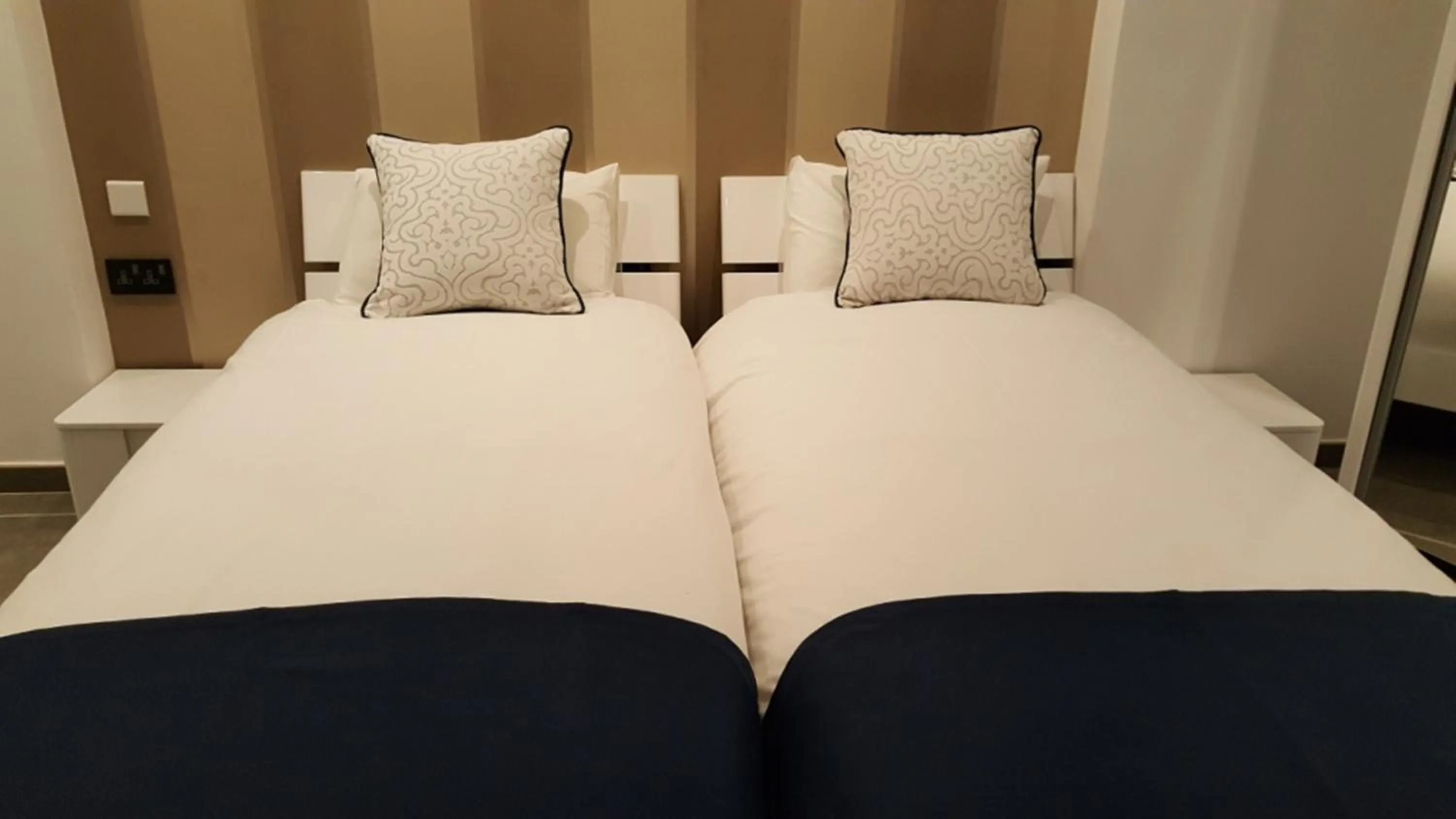 Bedroom in Pebbles Boutique Aparthotel