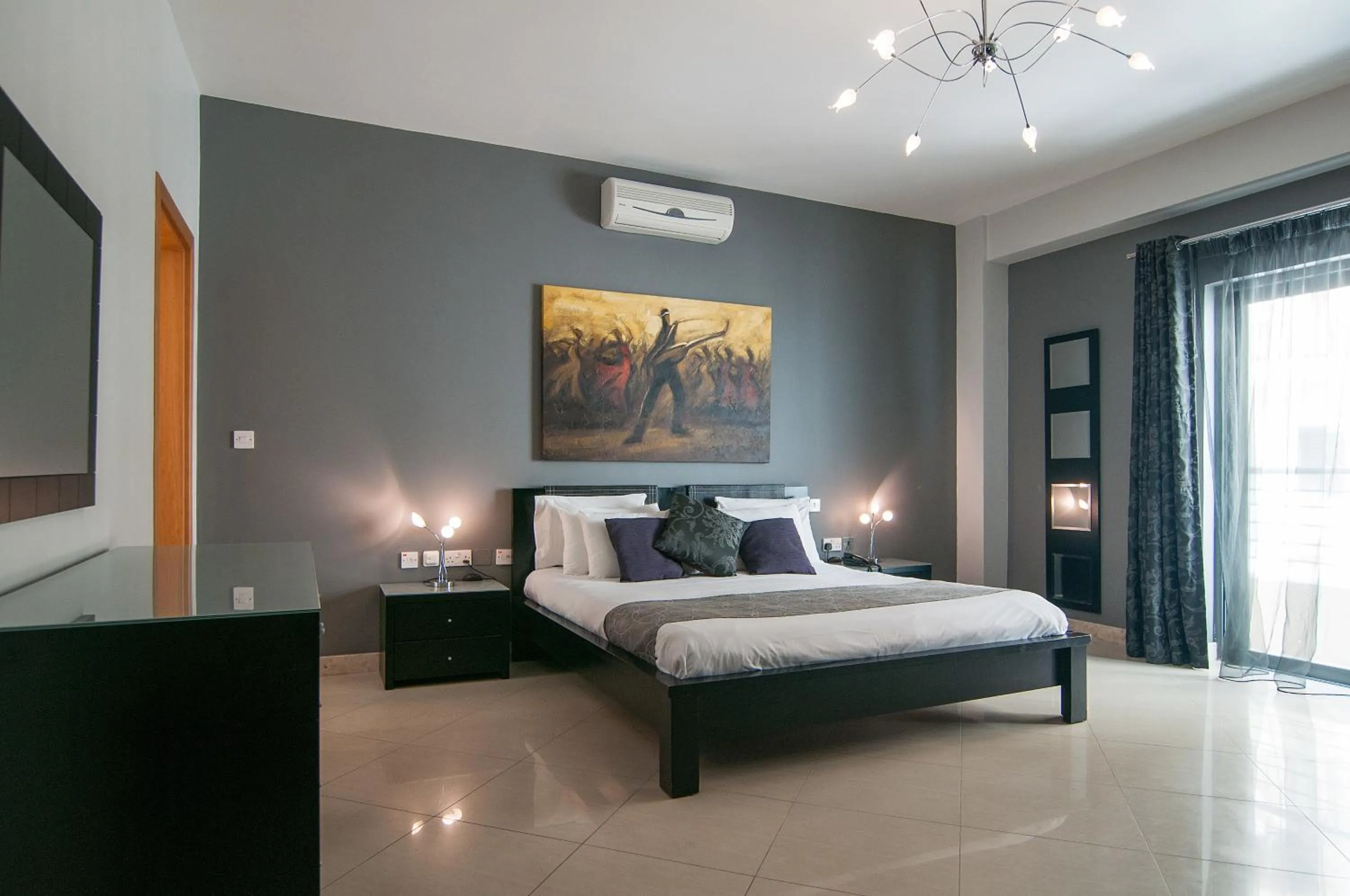 Bedroom in Pebbles Boutique Aparthotel