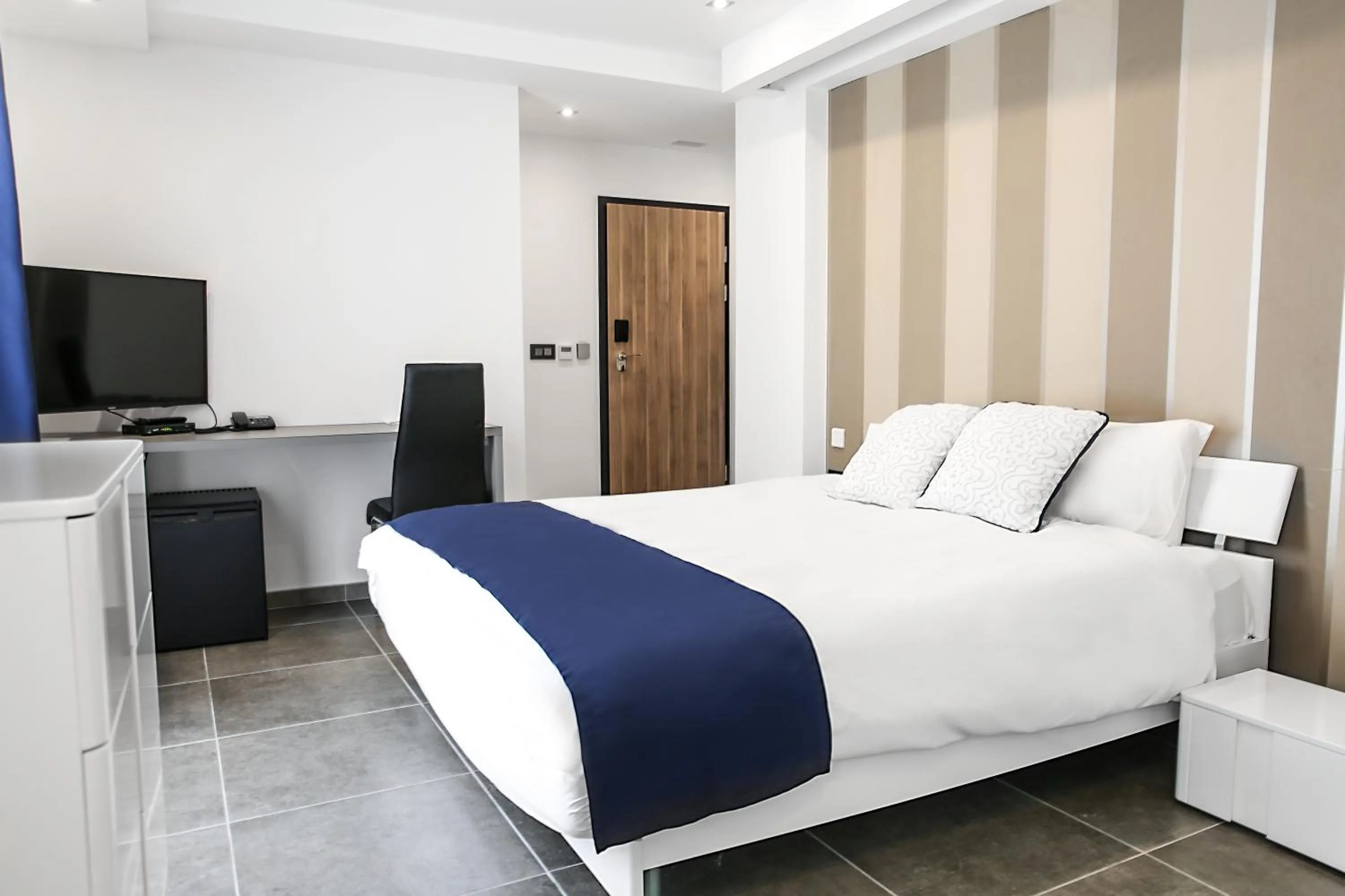 Bedroom in Pebbles Boutique Aparthotel