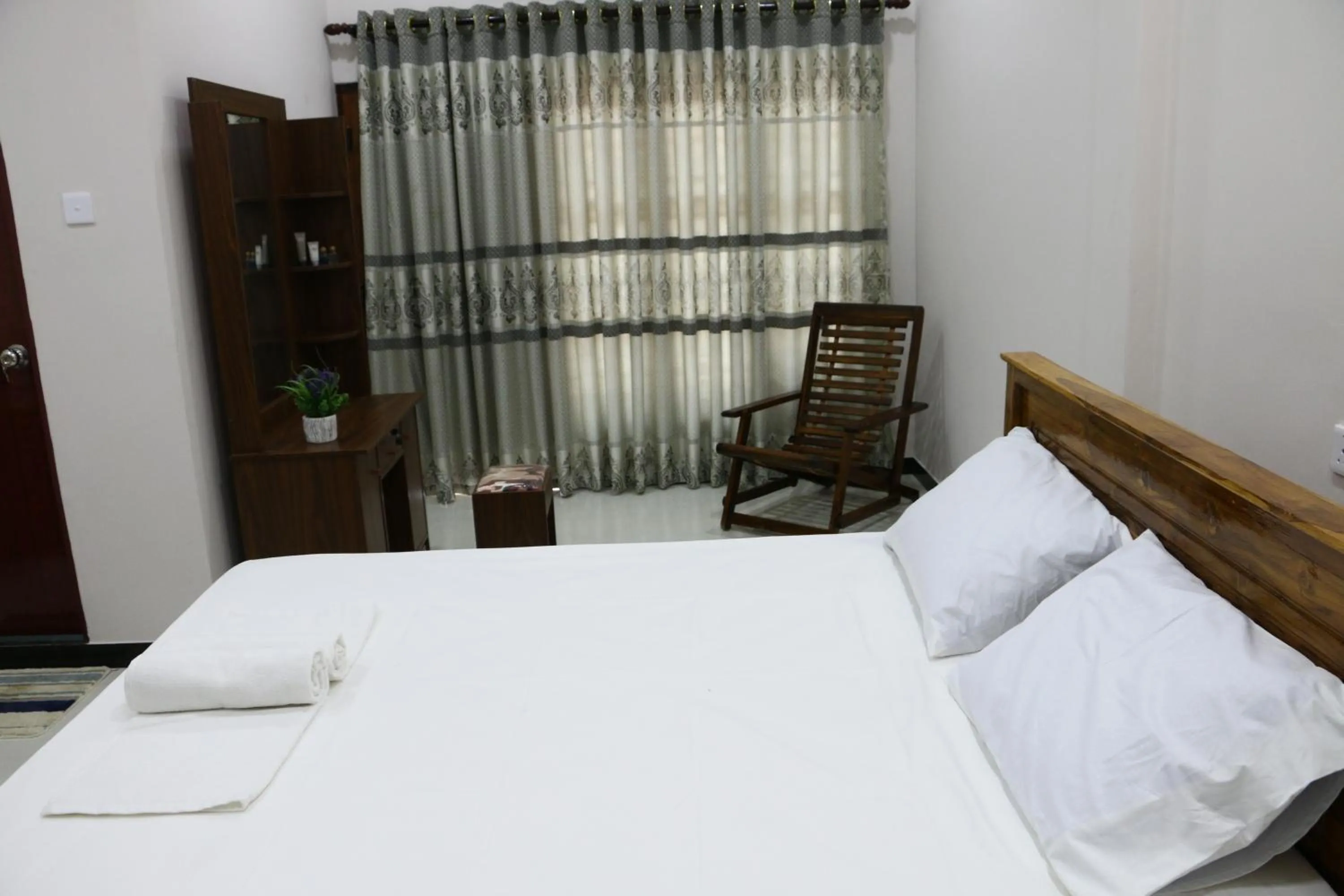 Photo of the whole room, Bed in Thisha Hotel & Restaurant
