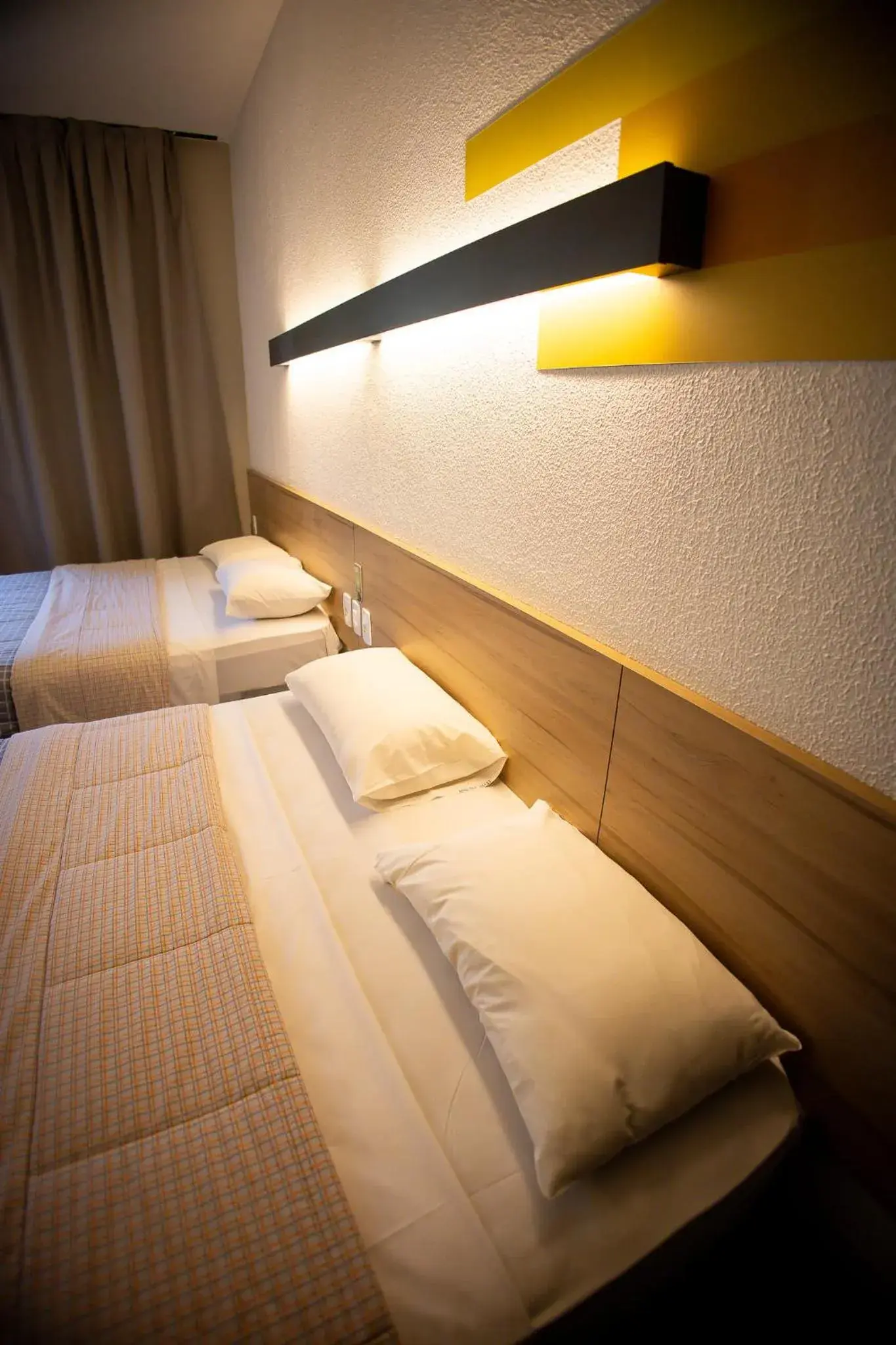 Bed in Hotel 10 Joinville Bed in Hotel 10 Joinville