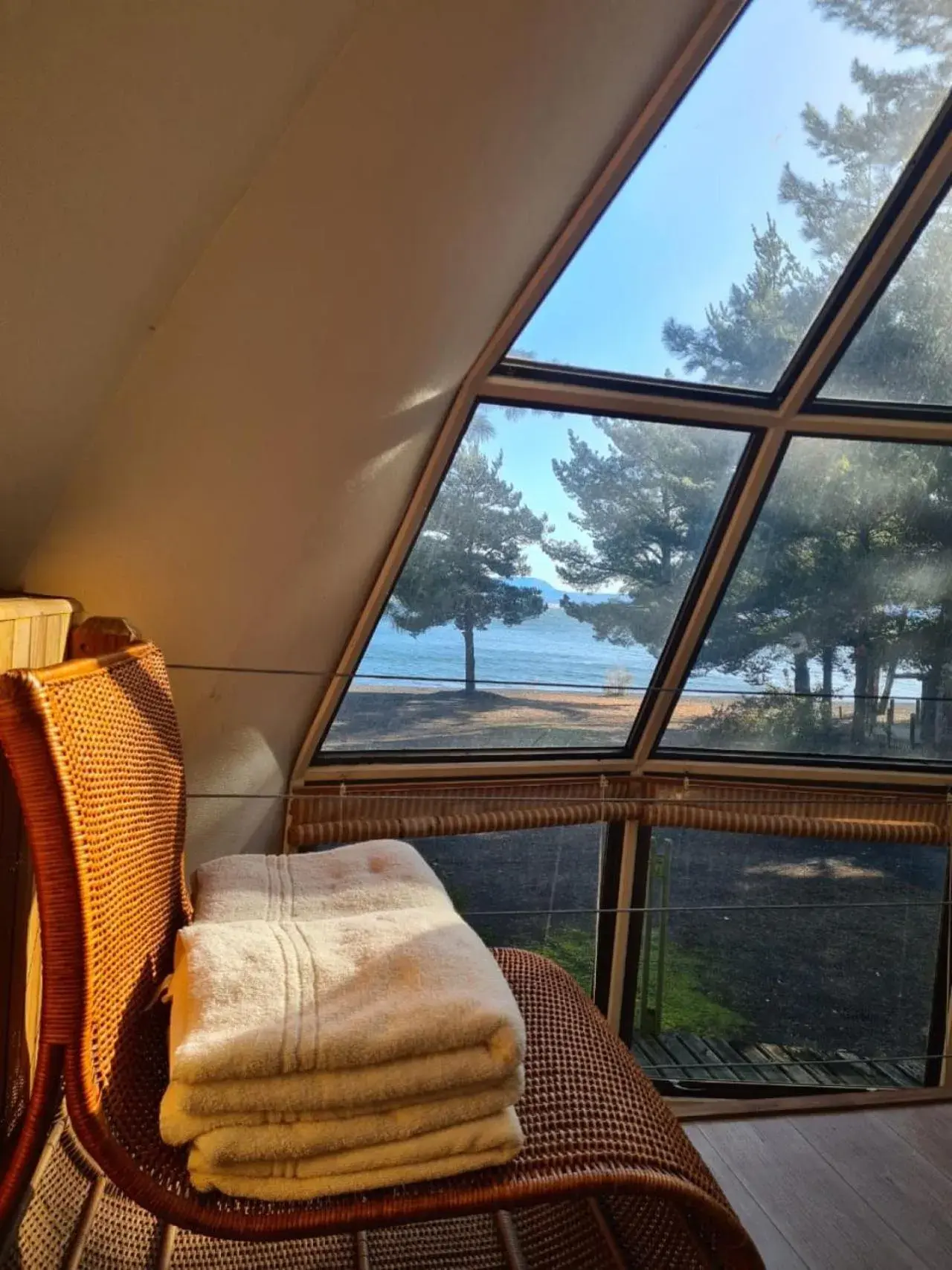 Lake view, Bed in Magma Lodge, Pucon Lake view, Bed in Magma Lodge, Pucon