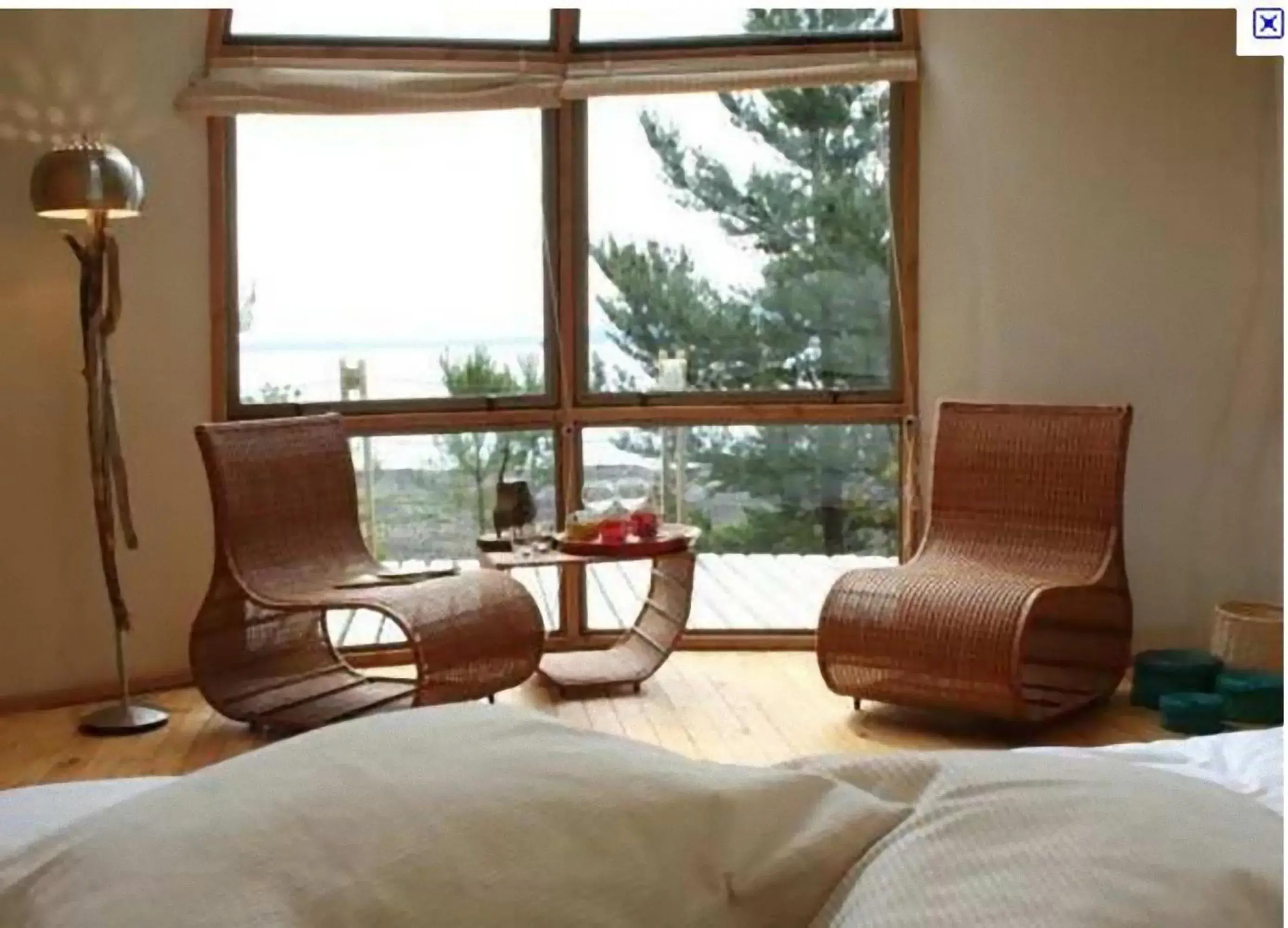 Seating area, Bed in Magma Lodge, Pucon Seating area, Bed in Magma Lodge, Pucon