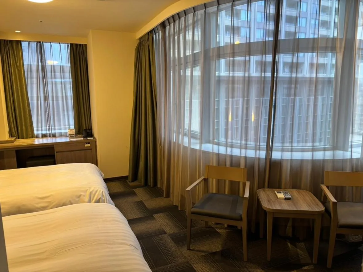 Bed in Dormy Inn Korakuen