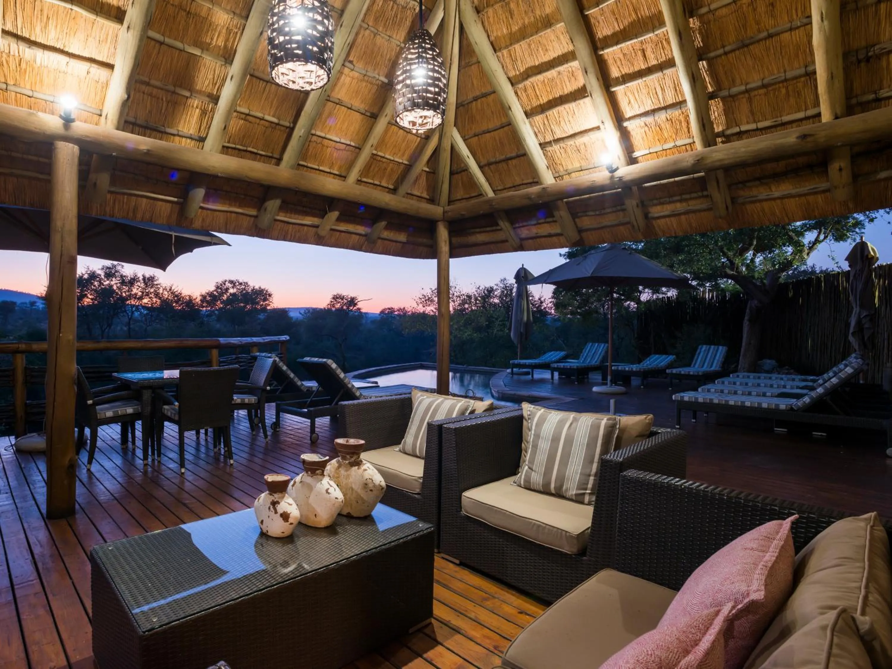 Lounge or bar in aha Thakadu River Camp