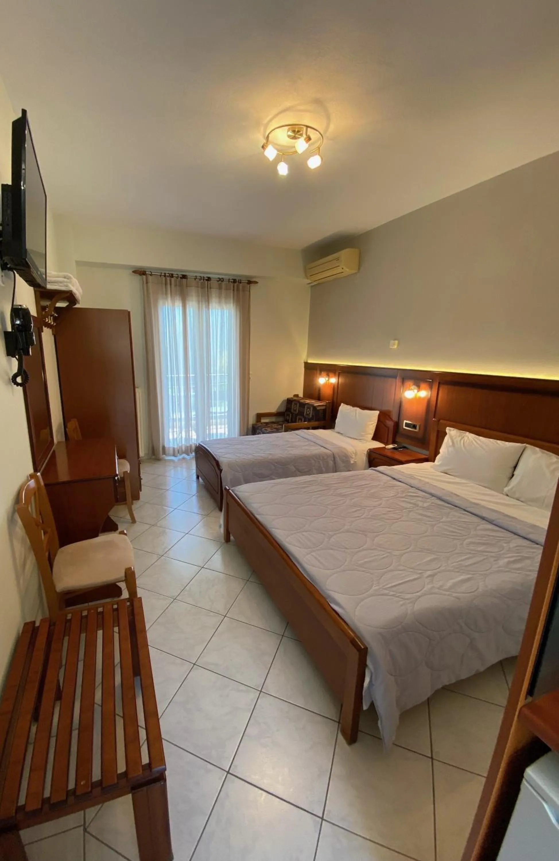 Bed in Paradosi Rooms