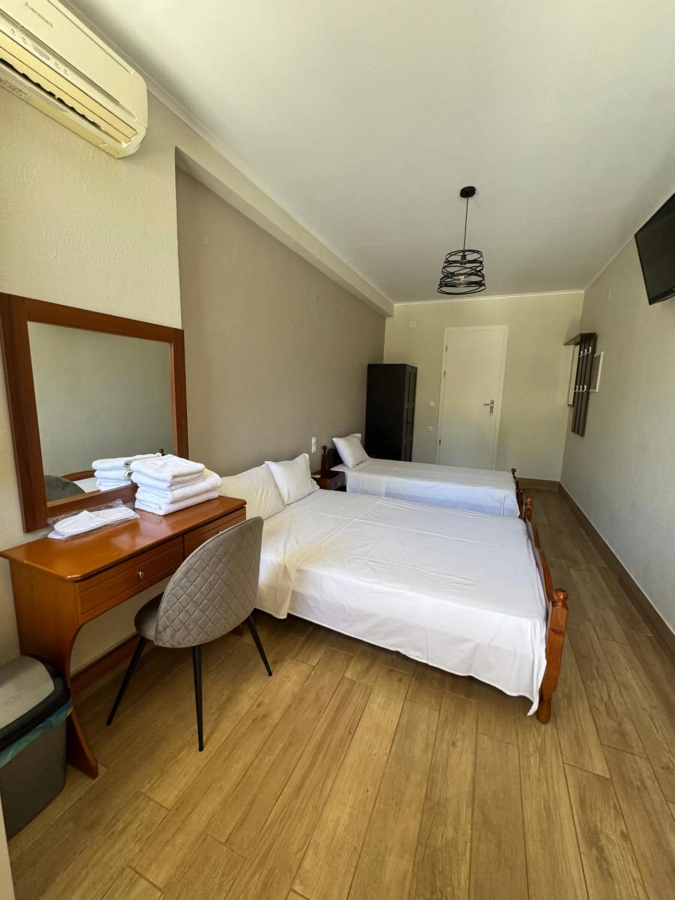 Bed in Paradosi Rooms