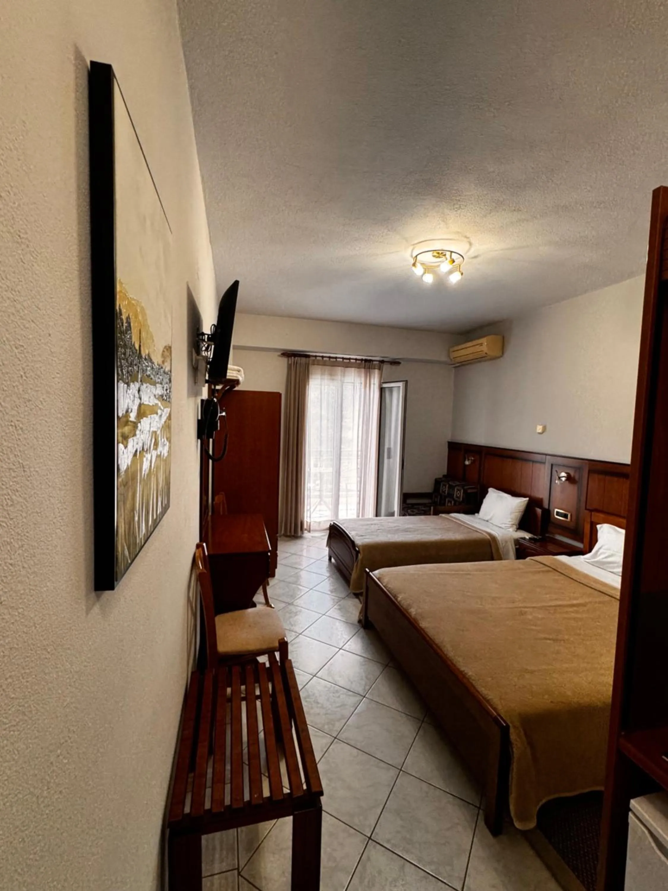 Bed in Paradosi Rooms