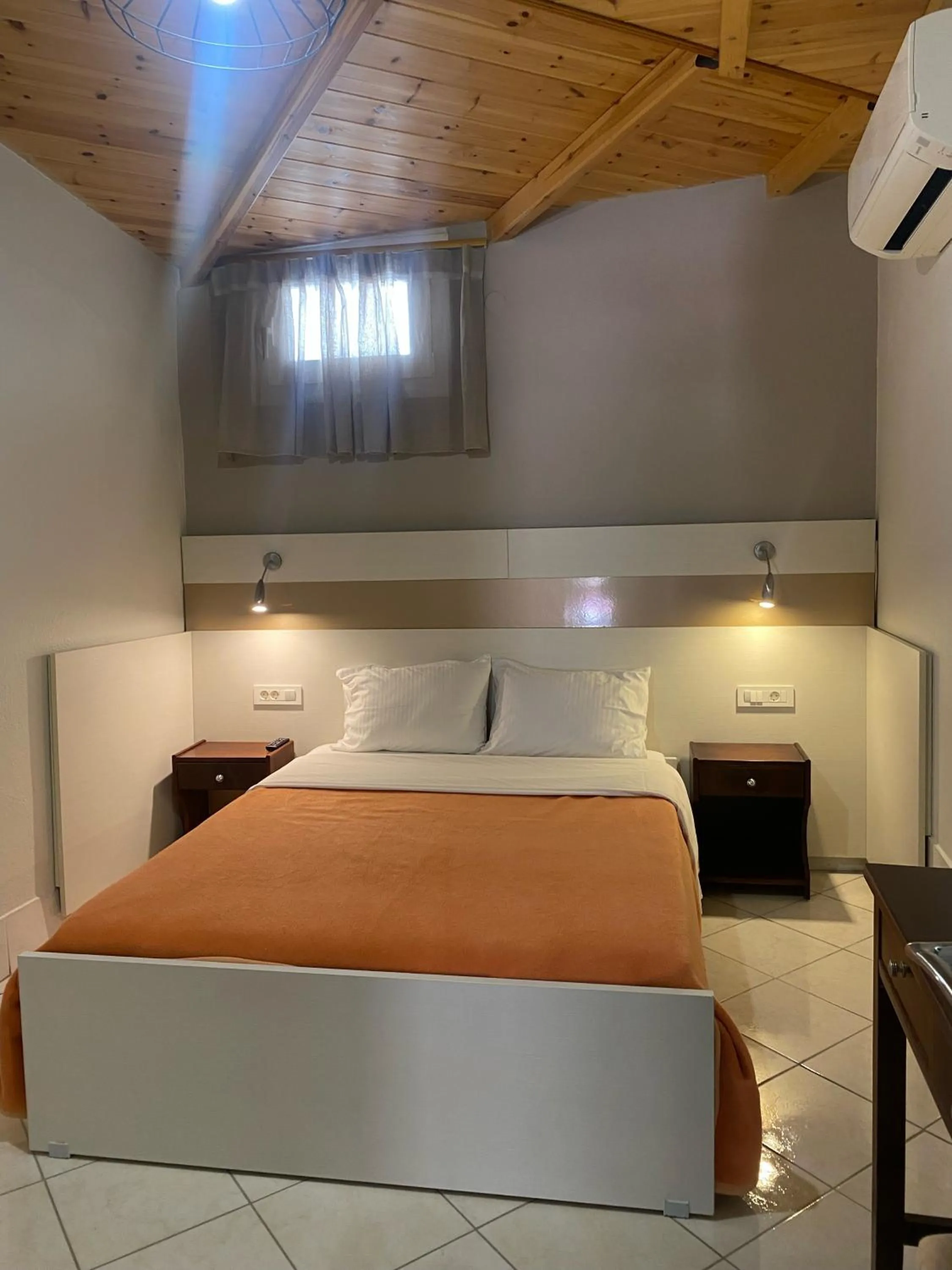 Bed in Paradosi Rooms