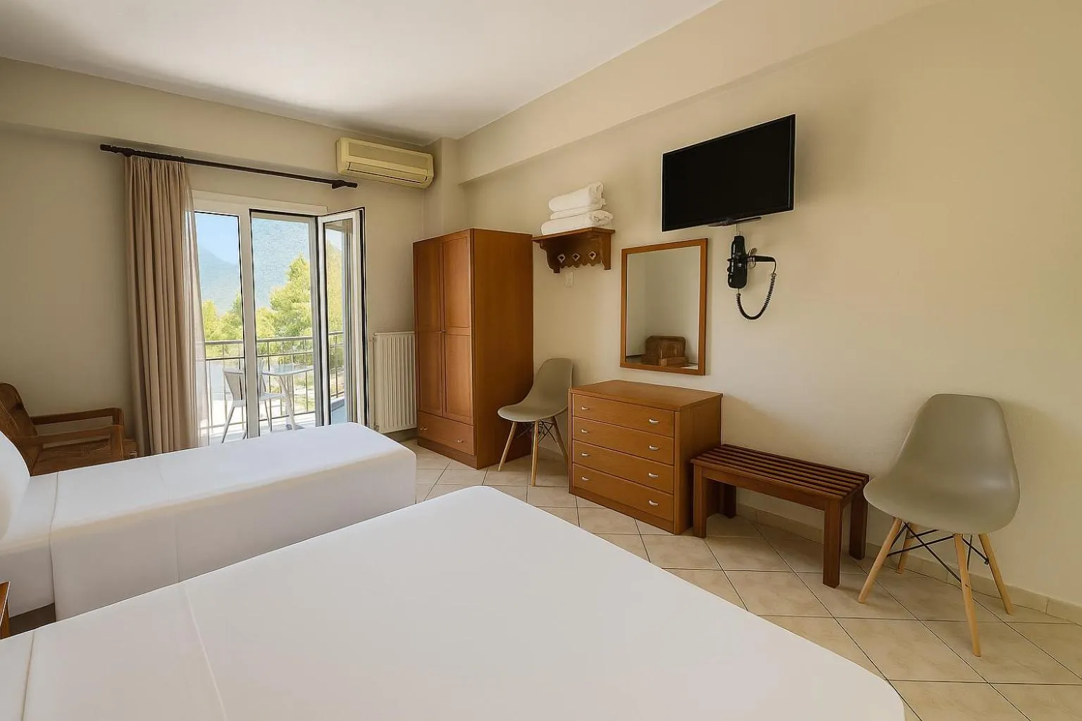 Bed in Paradosi Rooms