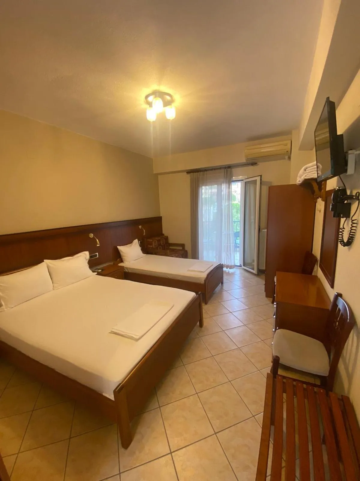 Bed in Paradosi Rooms