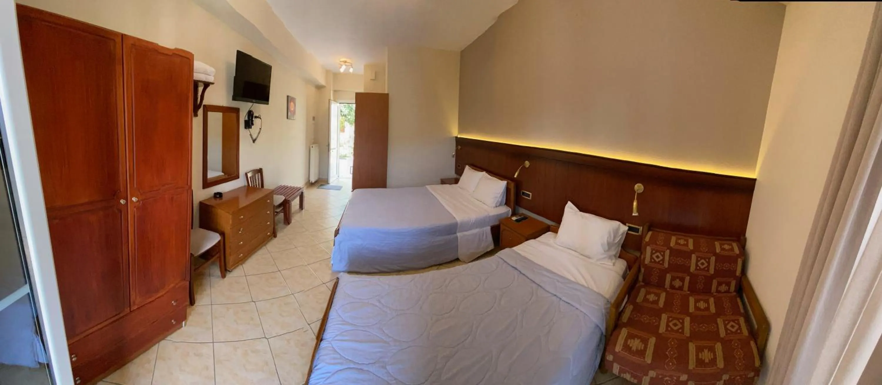 Bed in Paradosi Rooms