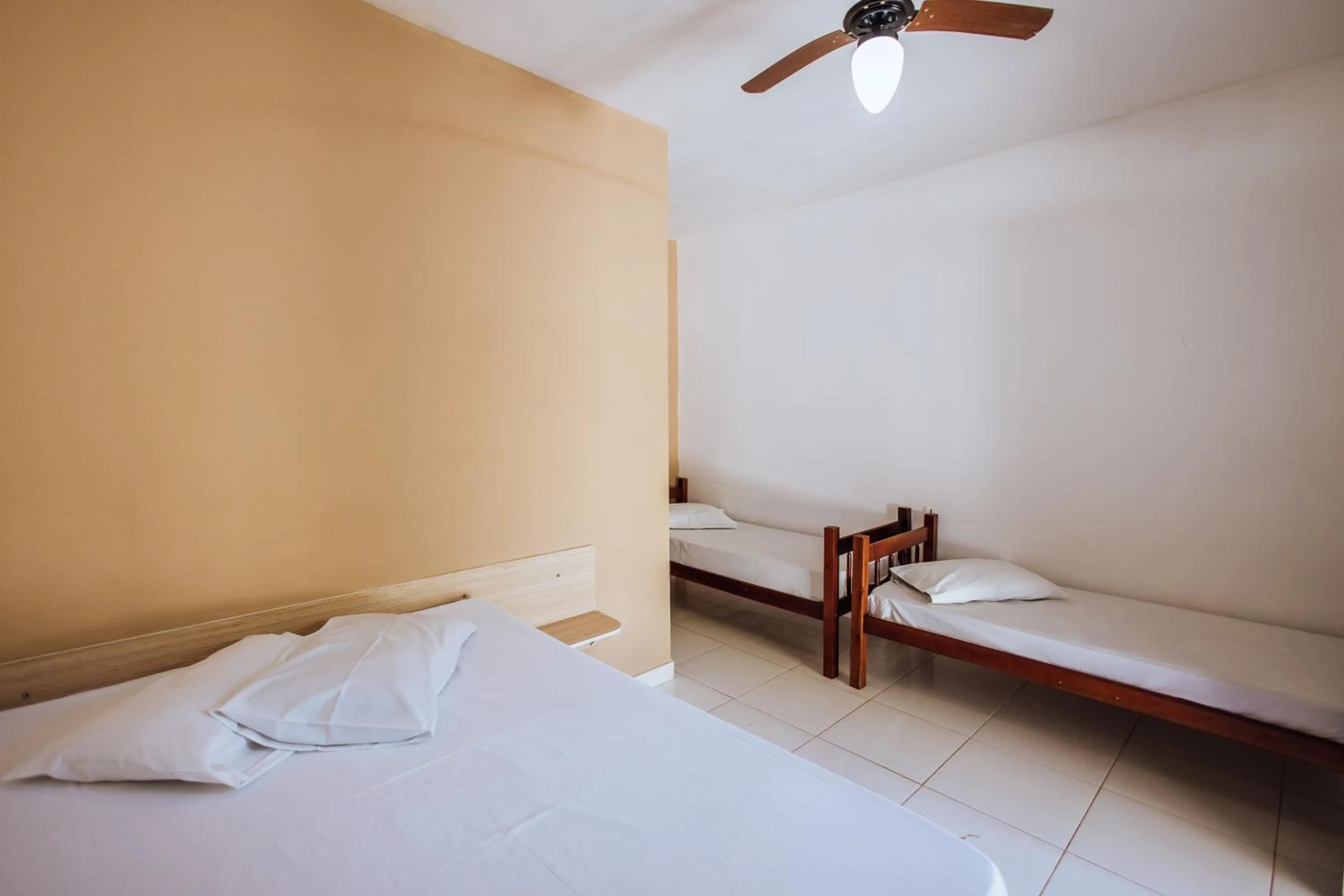 Bed in Pousada Sol Nascente