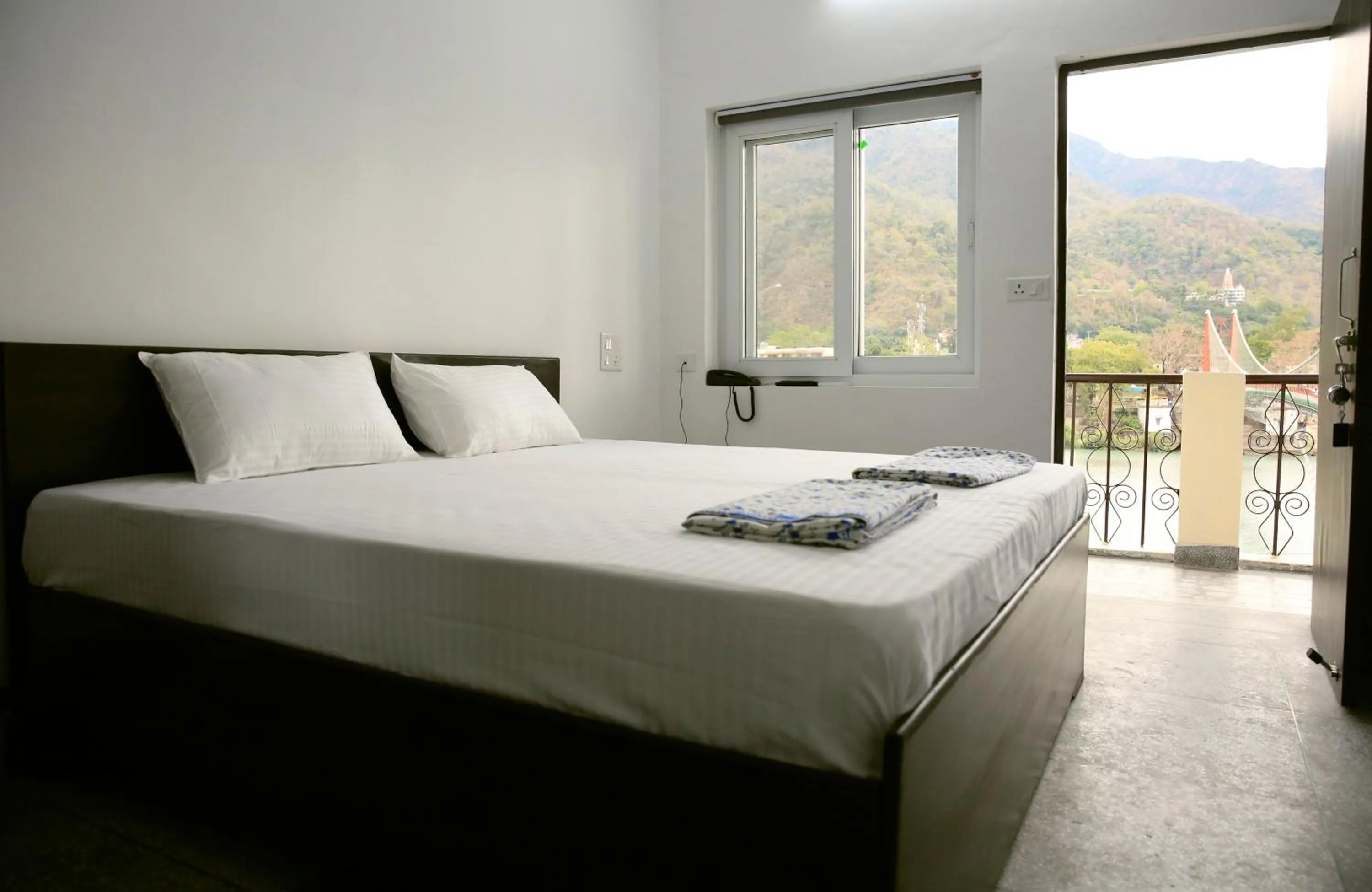 Bed in Sanidhya Inn
