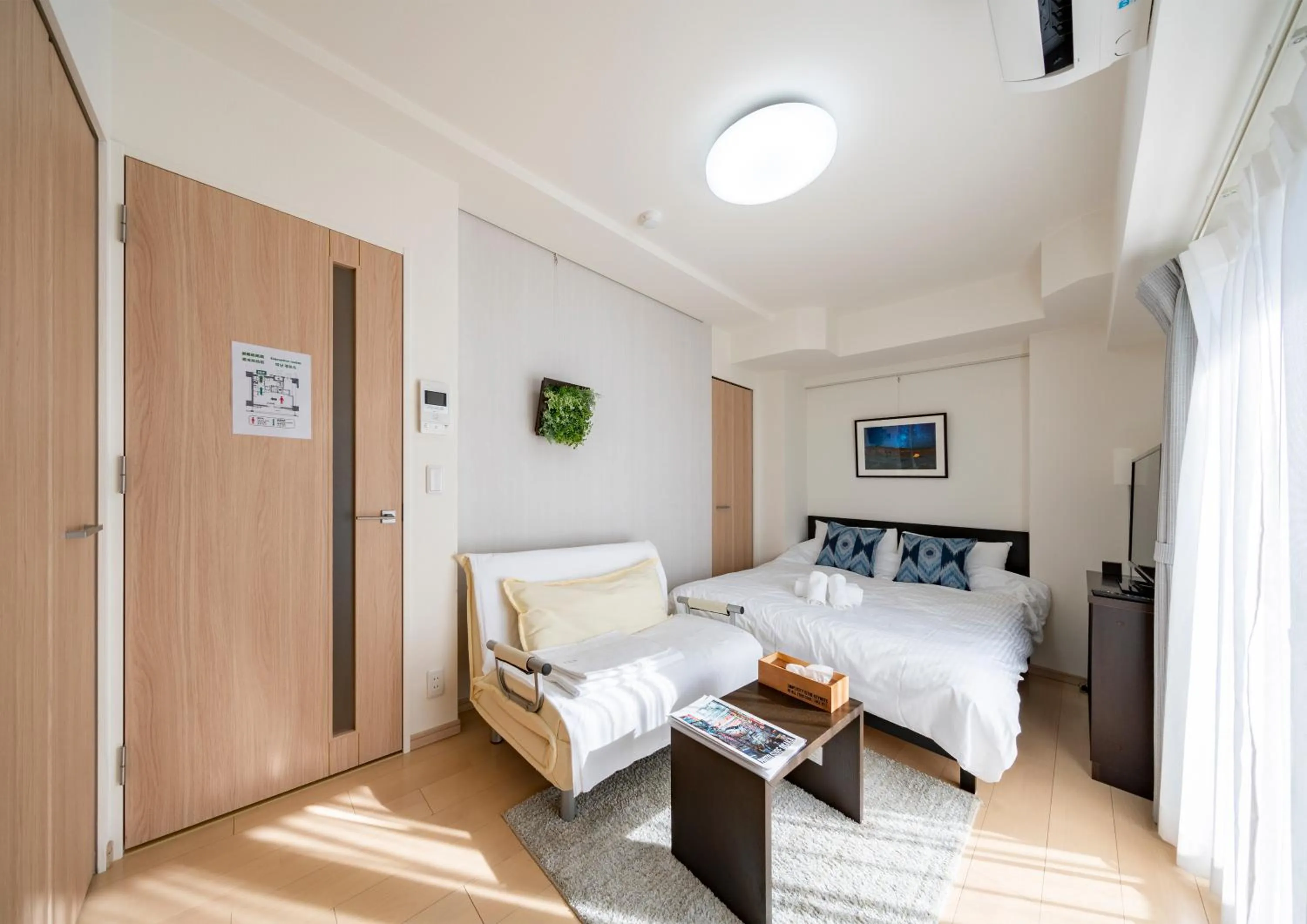 Living room, Bed in Meet Me Umeda Nishi