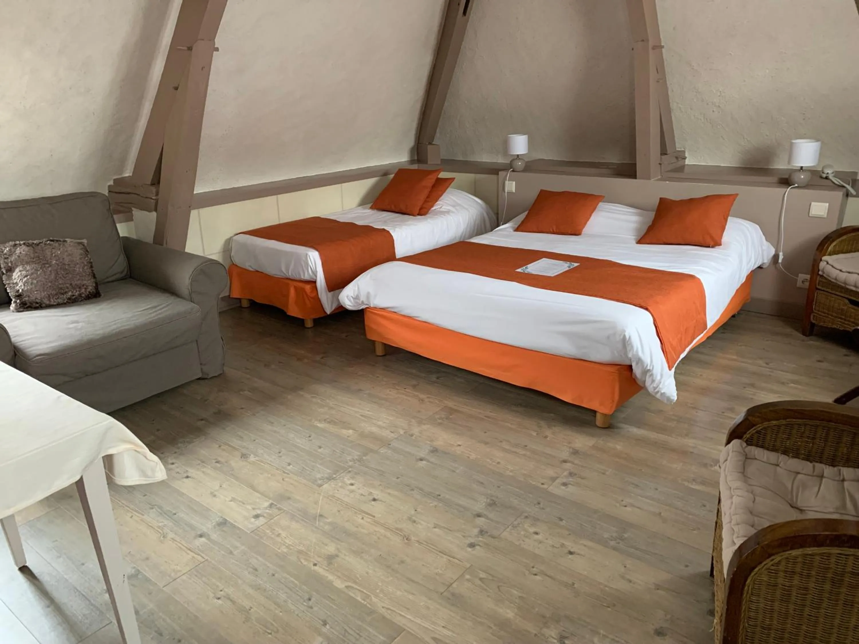 Bed in Hotel La Roseraie