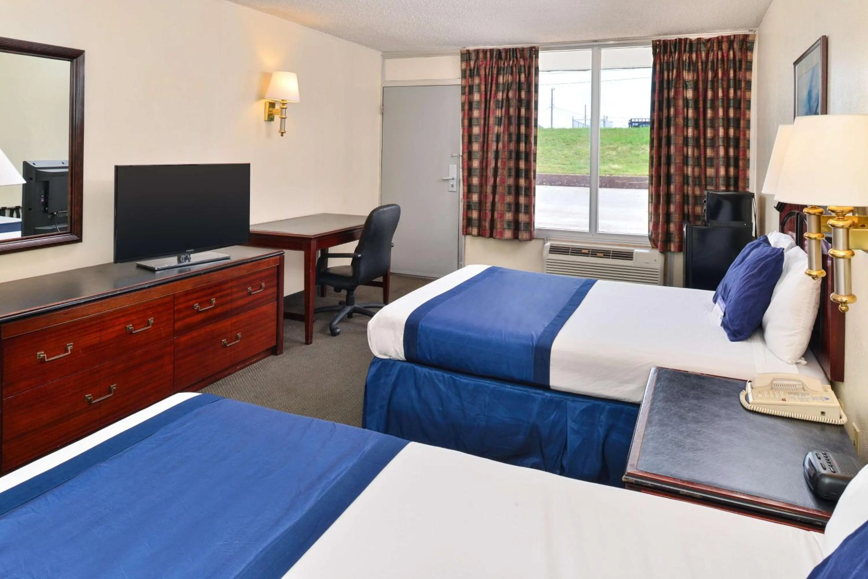 Bed in Castle Inn & Suites Anadarko