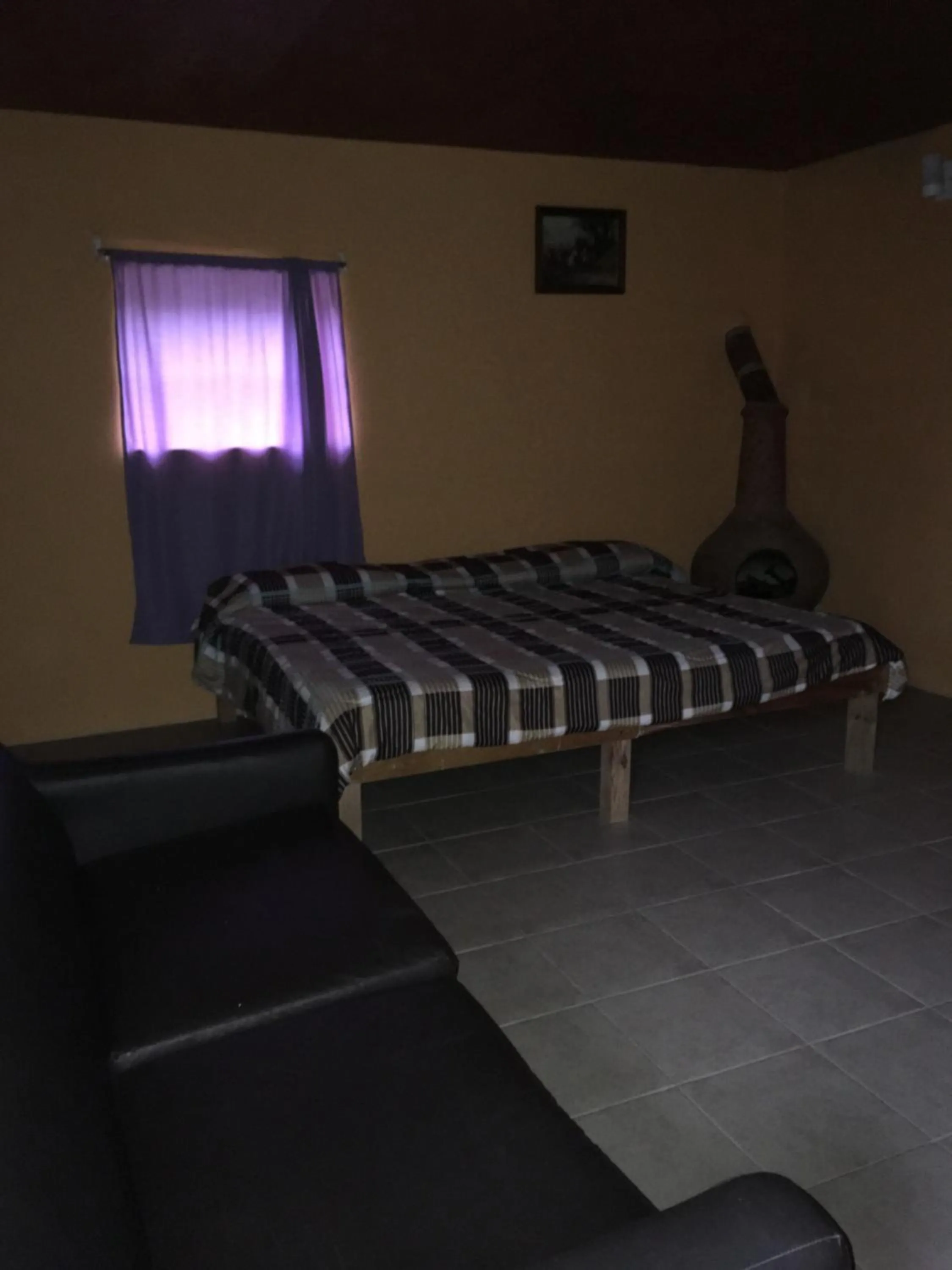 Economy Quadruple Room with Shared Bathroom in Posada Santa María