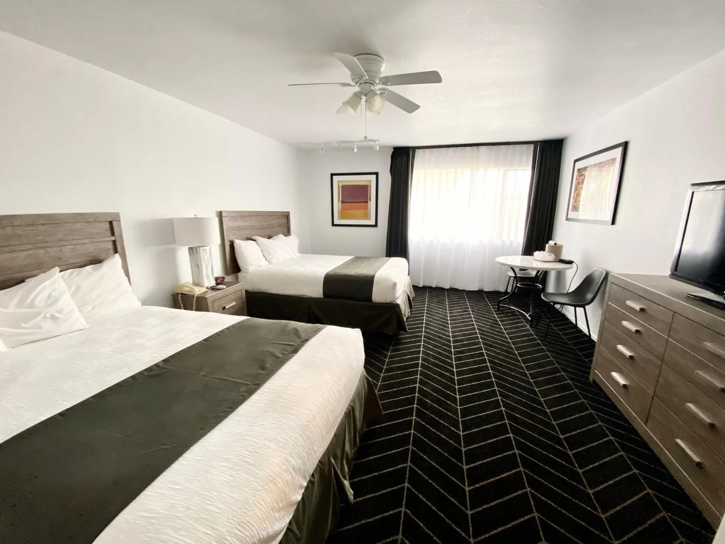 Bed in Masterpiece Hotel